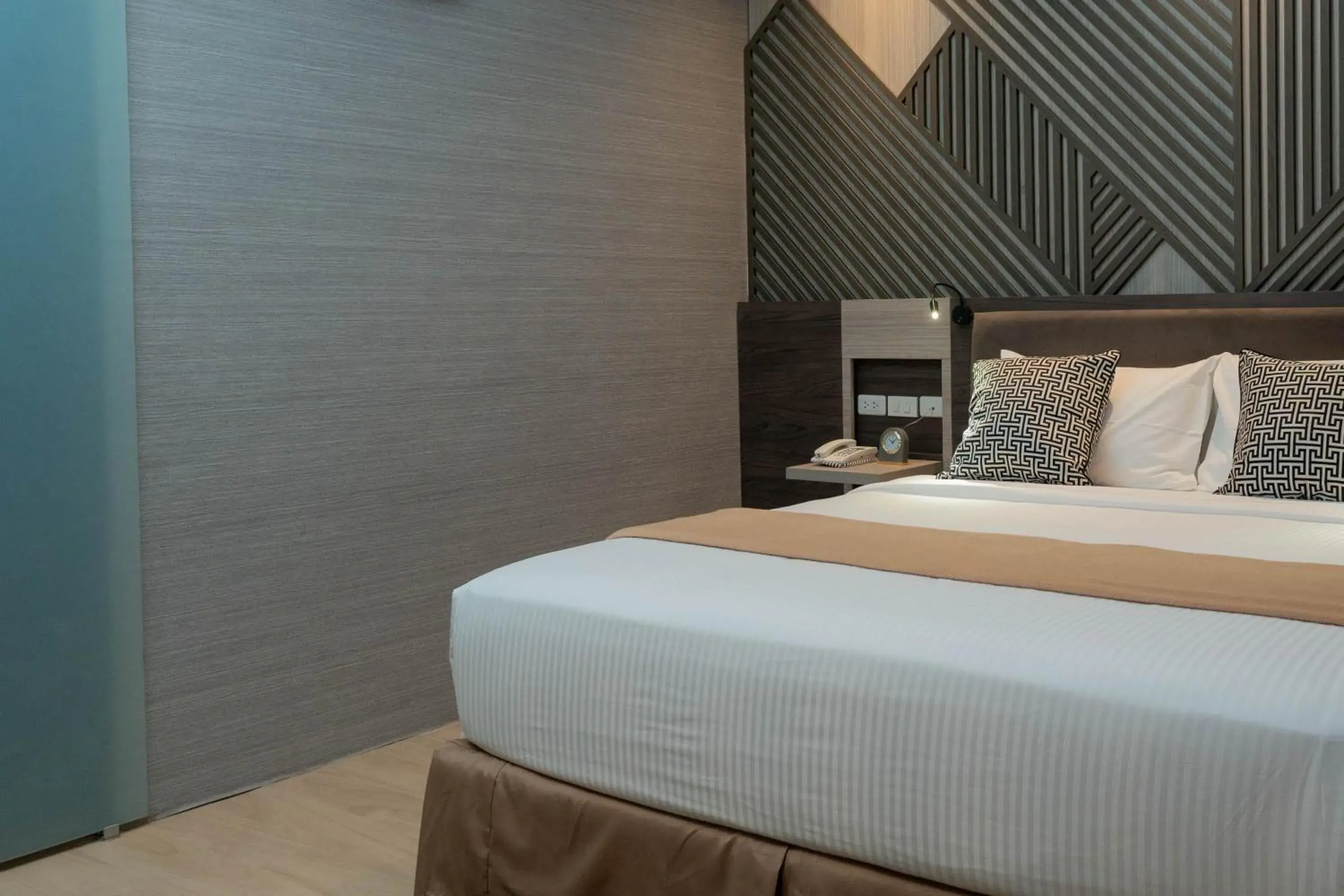 Bed in Adelina Hotel and Suites Bed in Adelina Hotel and Suites