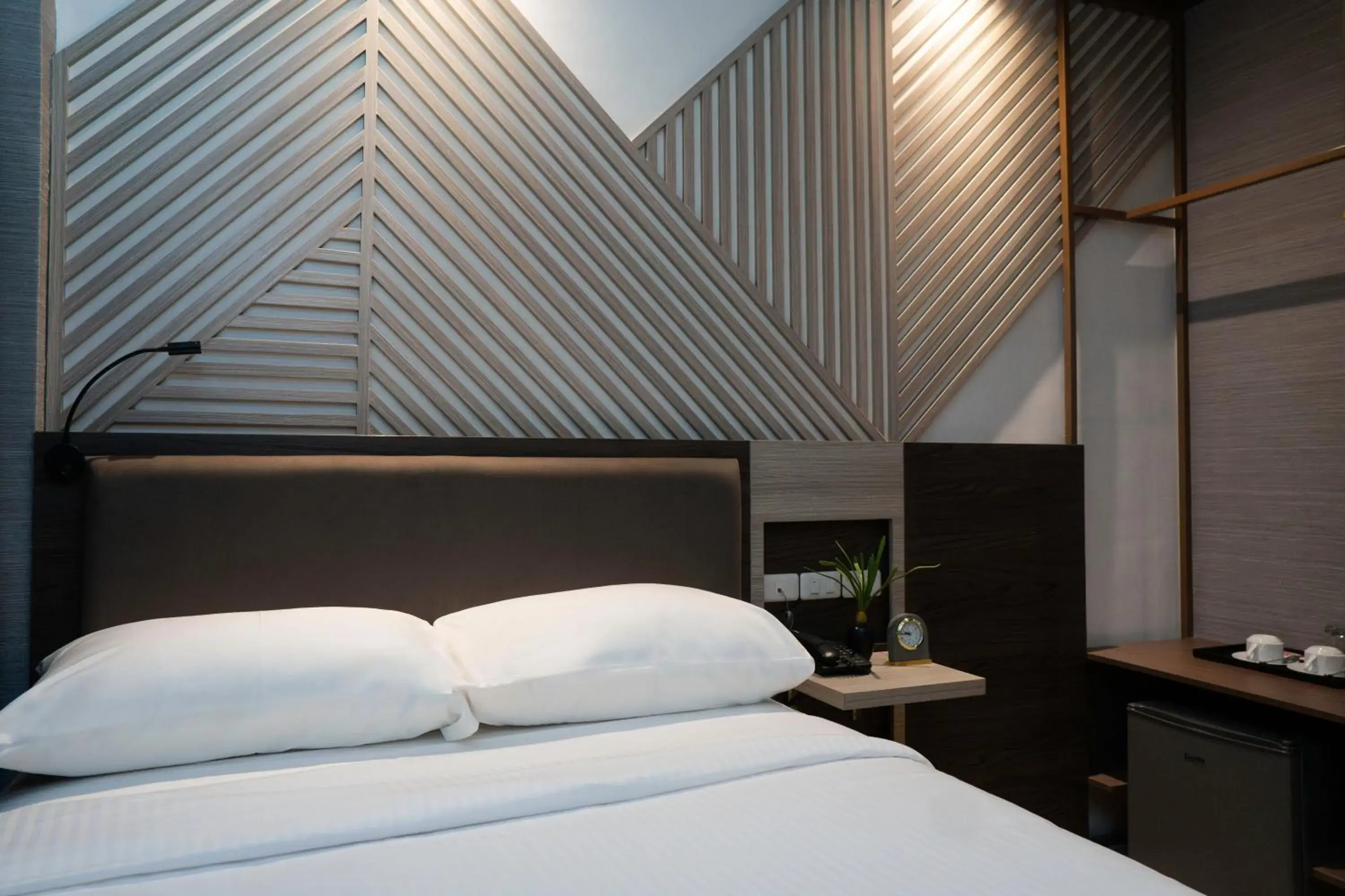 Bed in Adelina Hotel and Suites Bed in Adelina Hotel and Suites