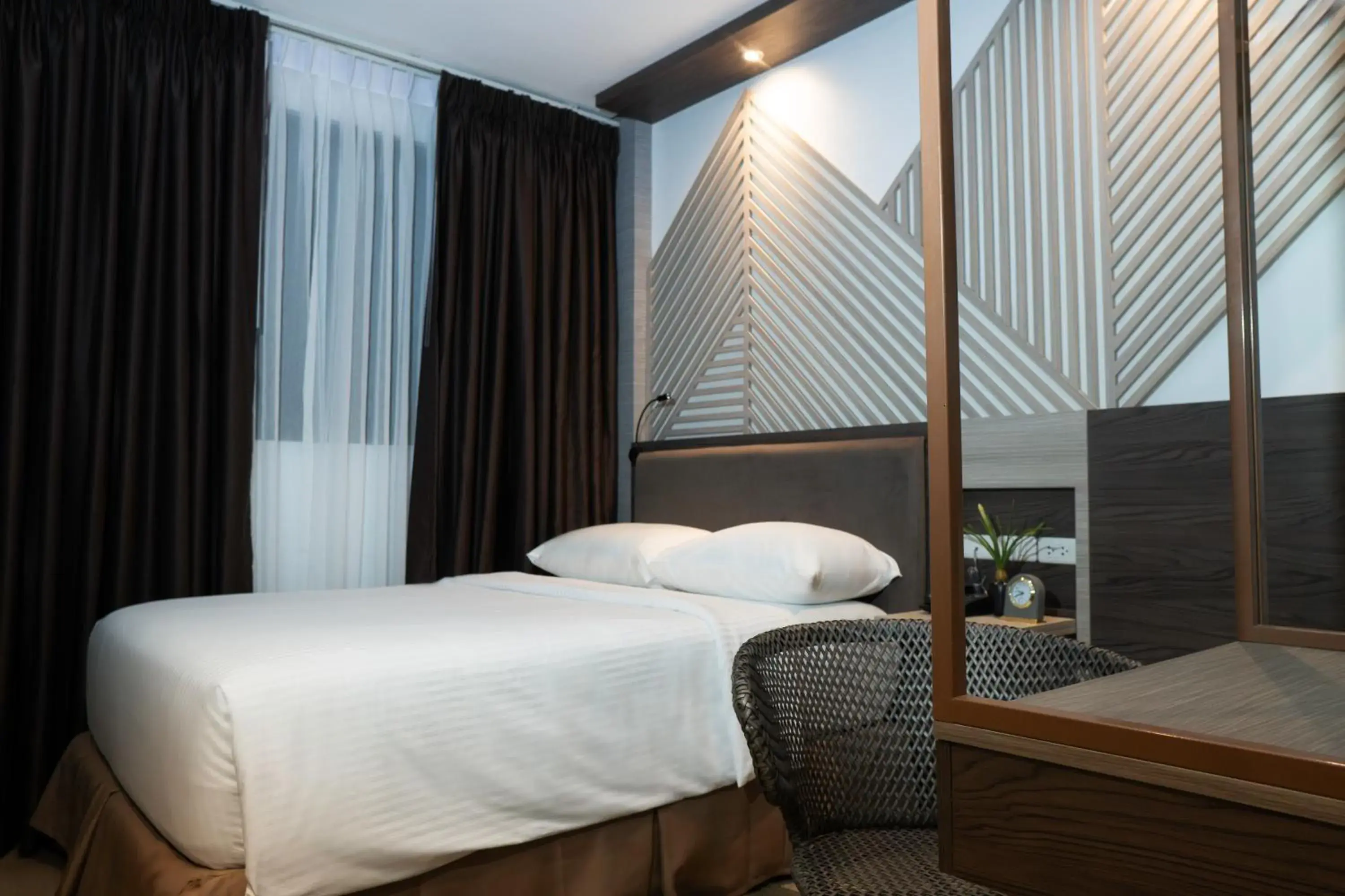 Bed in Adelina Hotel and Suites Bed in Adelina Hotel and Suites