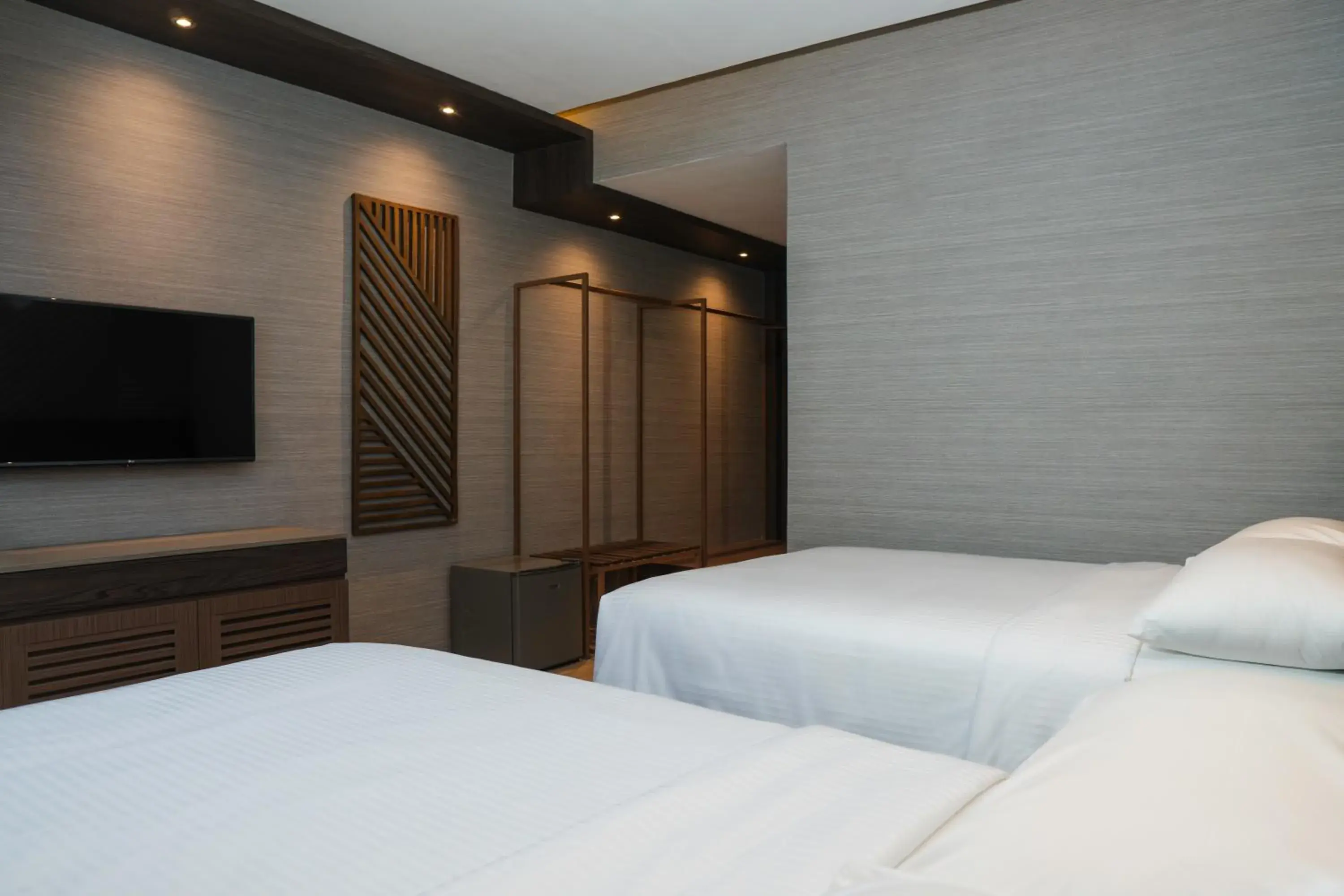 Bed in Adelina Hotel and Suites Bed in Adelina Hotel and Suites