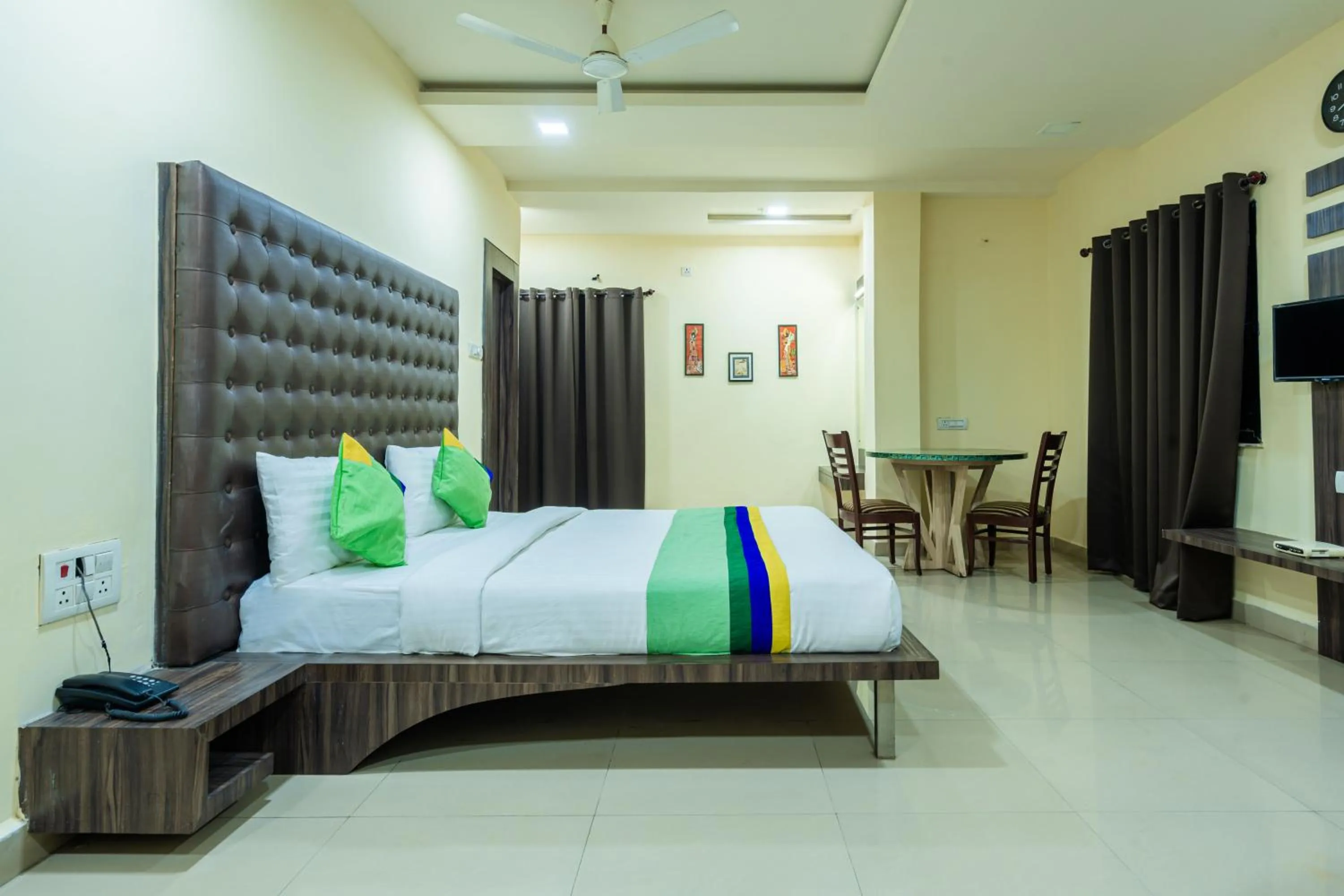 Bedroom, Bed in Treebo Udyam Glory