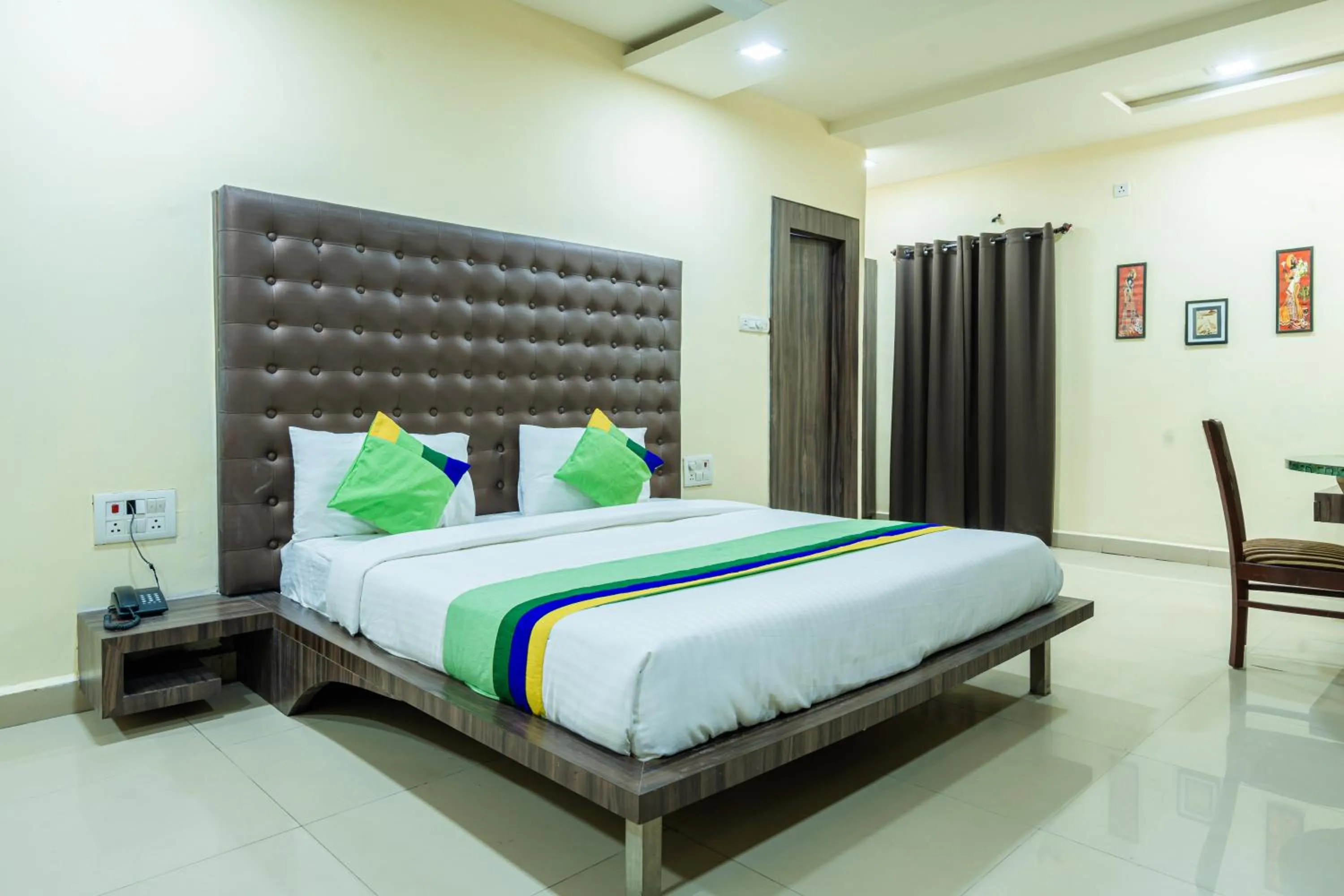 Bedroom, Bed in Treebo Udyam Glory