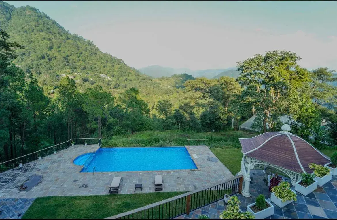 Swimming pool in Samsara Luxury Cottages & Spa, Chail Hills Swimming pool in Samsara Luxury Cottages & Spa, Chail Hills