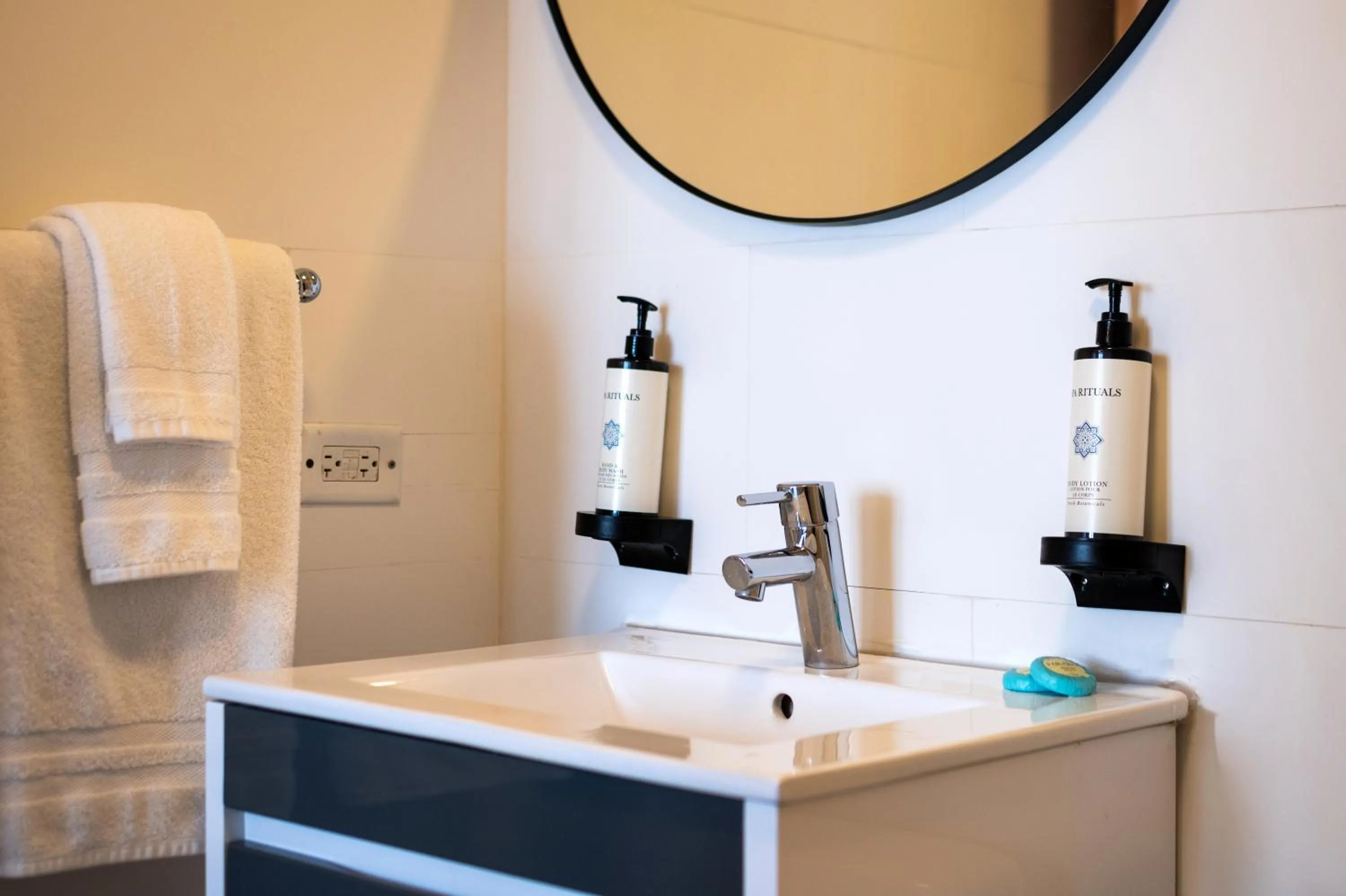 Bathroom in La Mona Loiza Apartment Complex by Stay with Bear