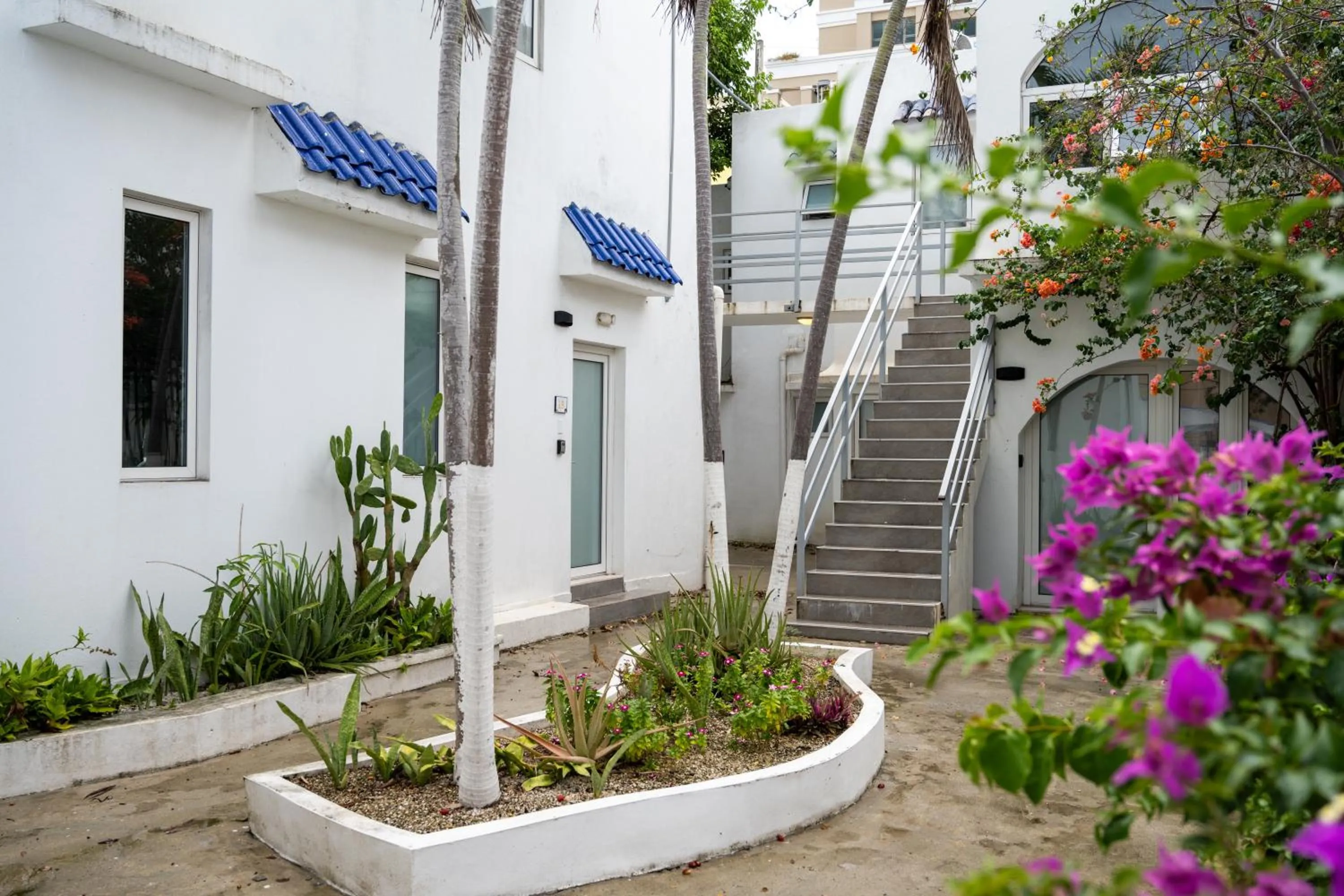 Property building in La Mona Loiza Apartment Complex by Stay with Bear