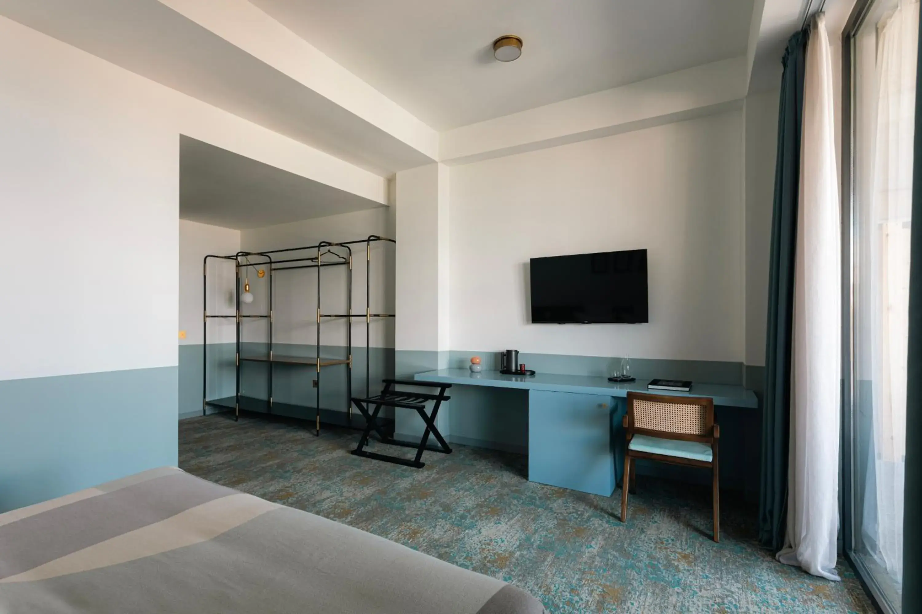 TV and multimedia, Bed in Castor & Pollux Hotel TV and multimedia, Bed in Castor & Pollux Hotel