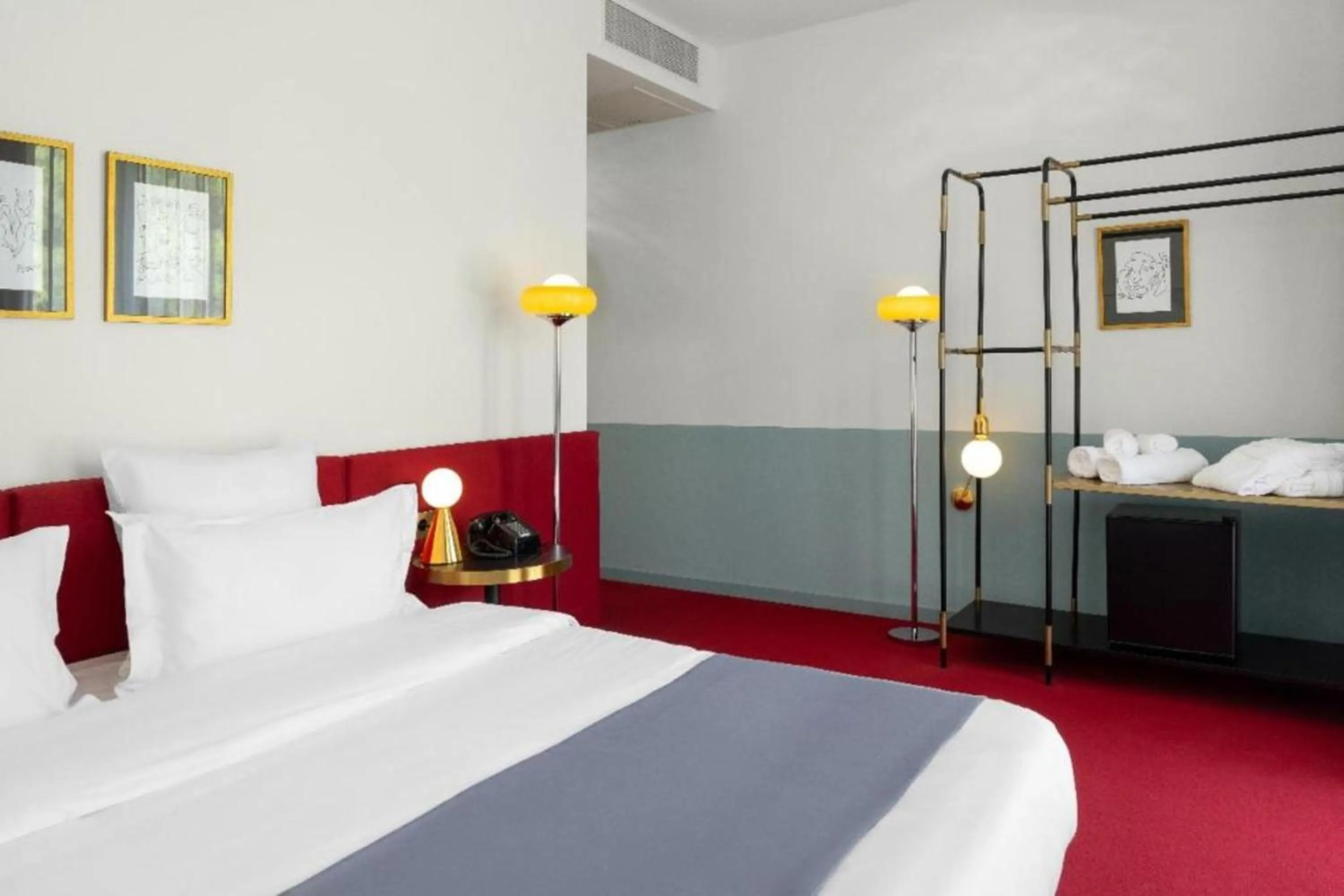 Bed in Castor & Pollux Hotel