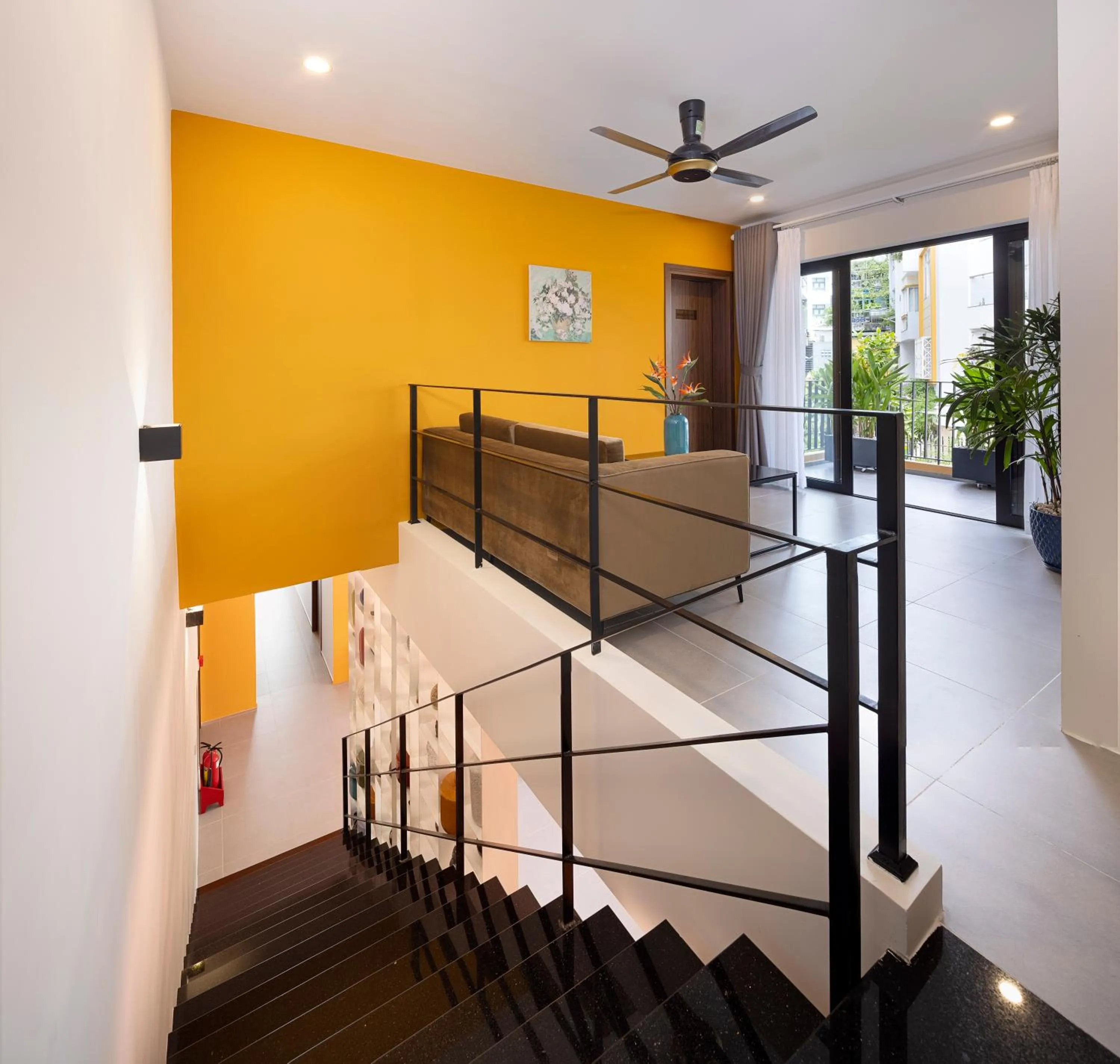 Communal lounge/ TV room in Terracotta Villa Saigon