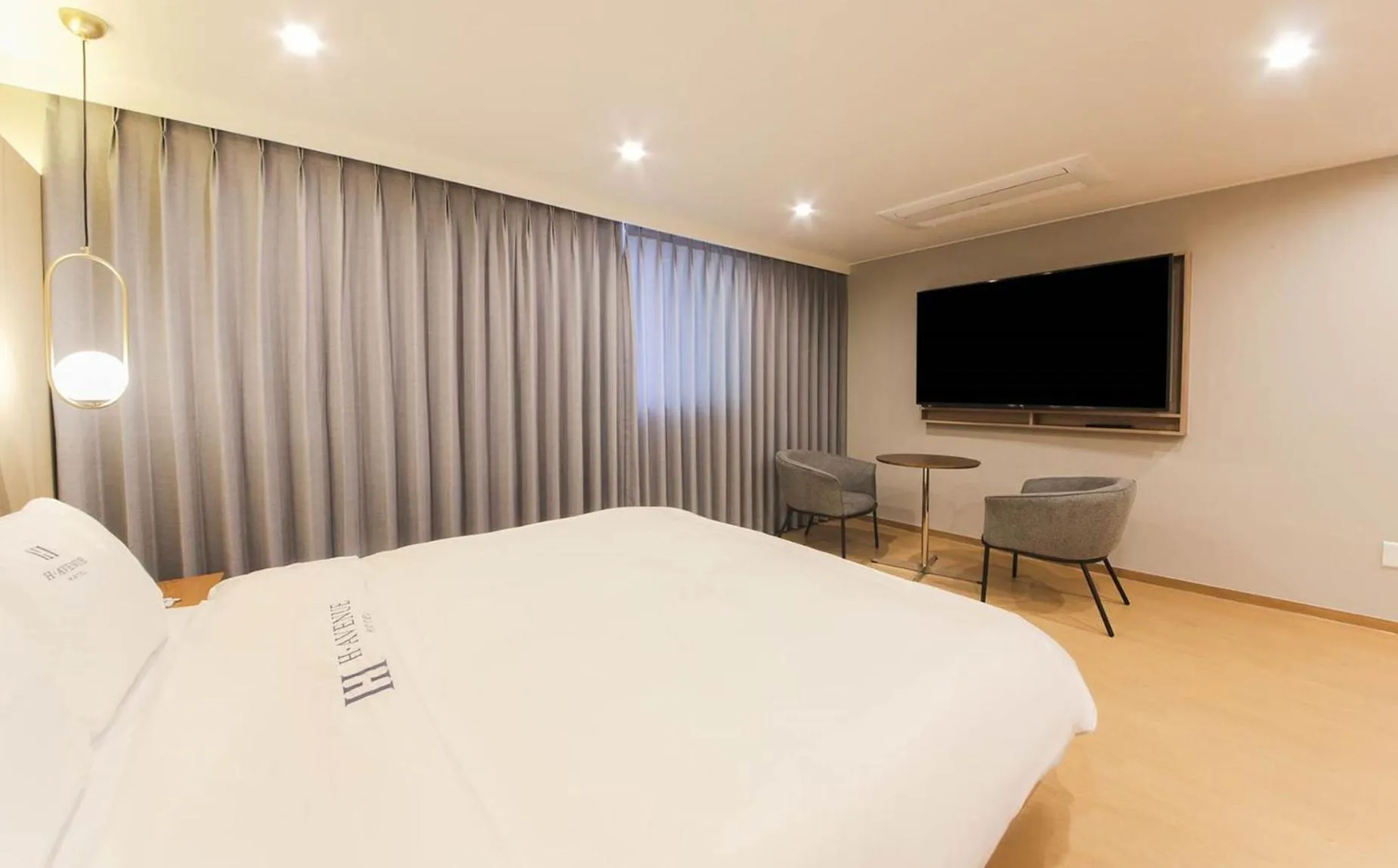 Bed in H Avenue Hotel in Gyeongju