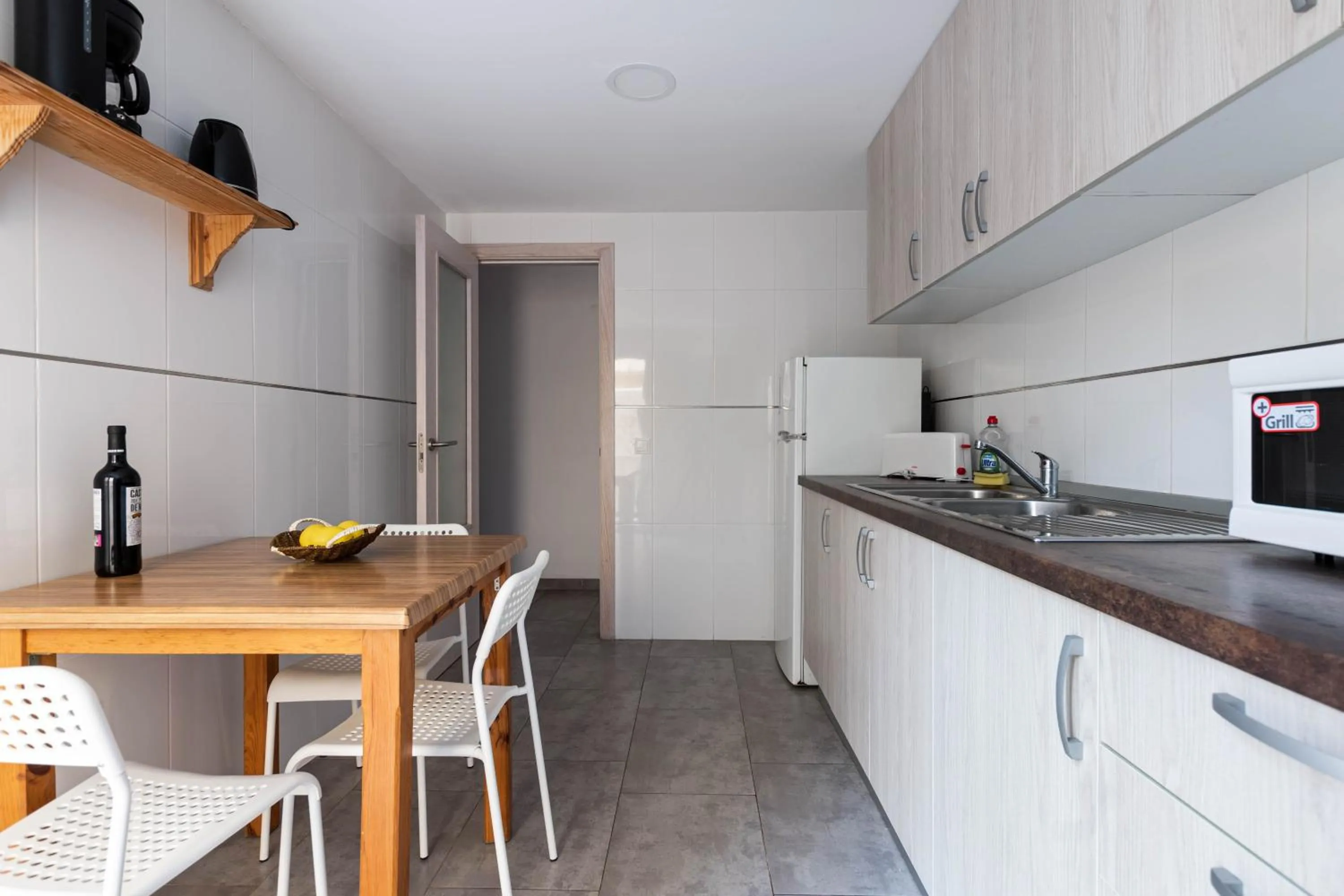 Kitchen or kitchenette in Acapulco Apartments