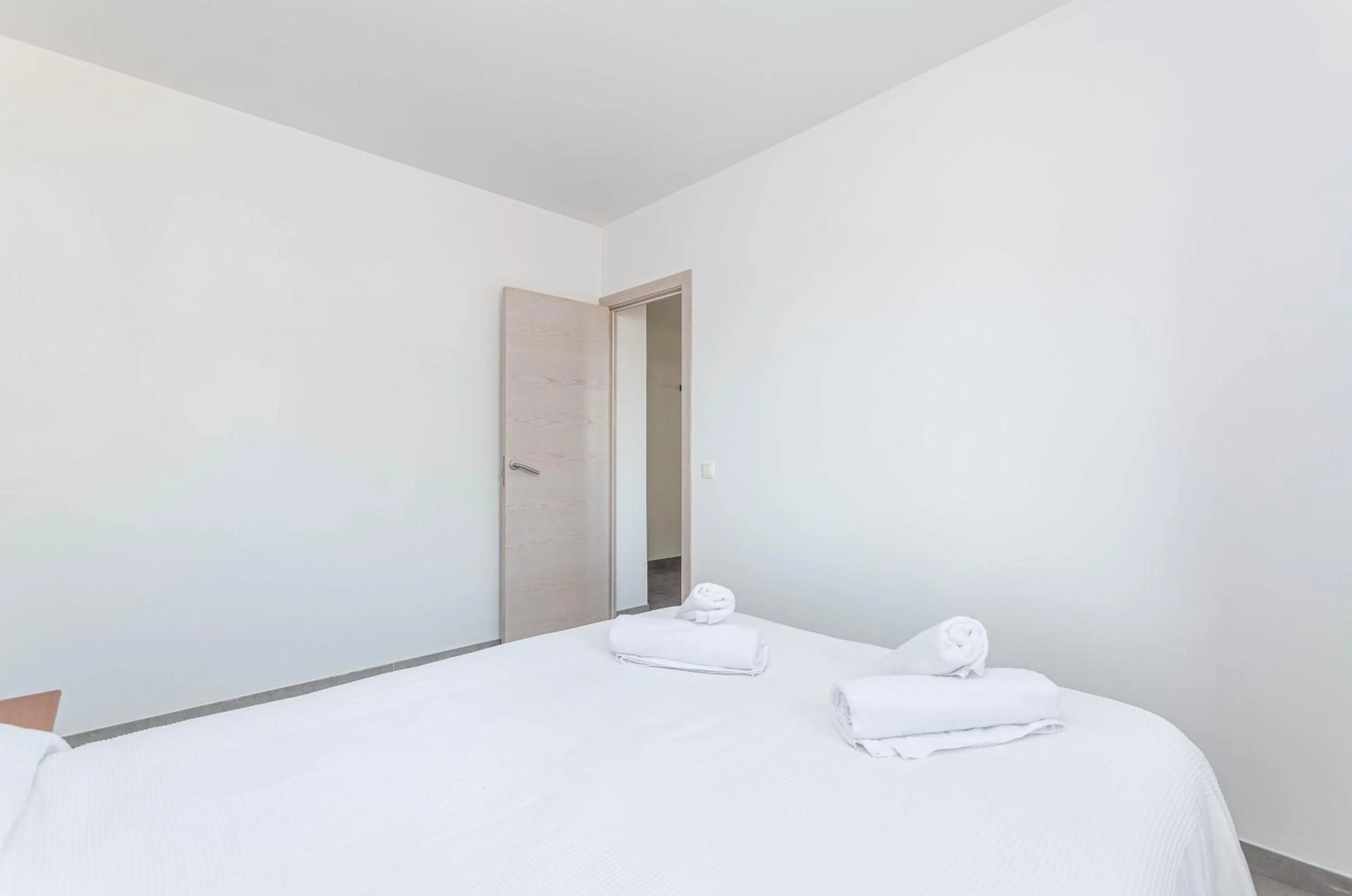 Bed in Acapulco Apartments