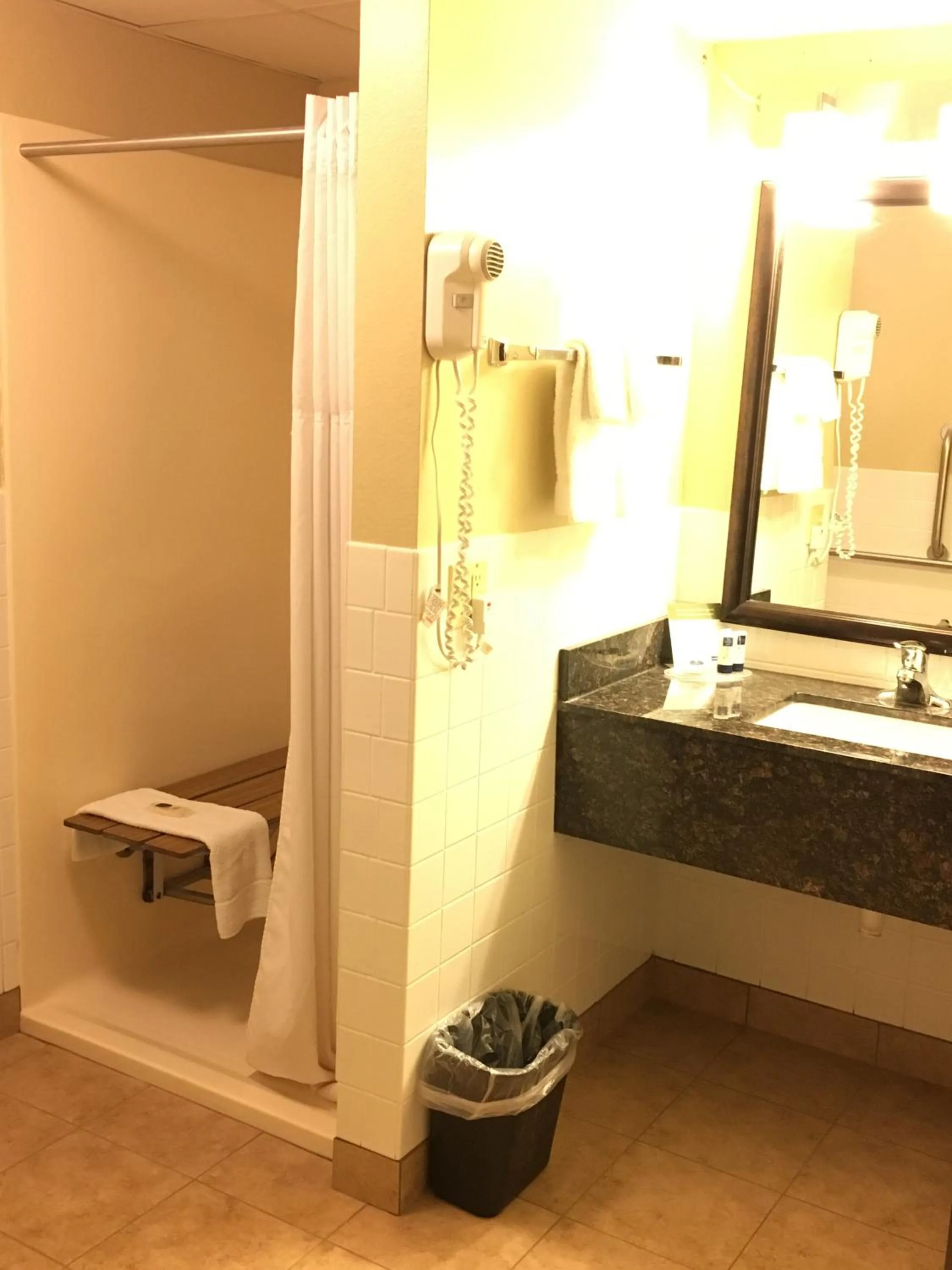 Bathroom in AmericInn by Wyndham Menomonie