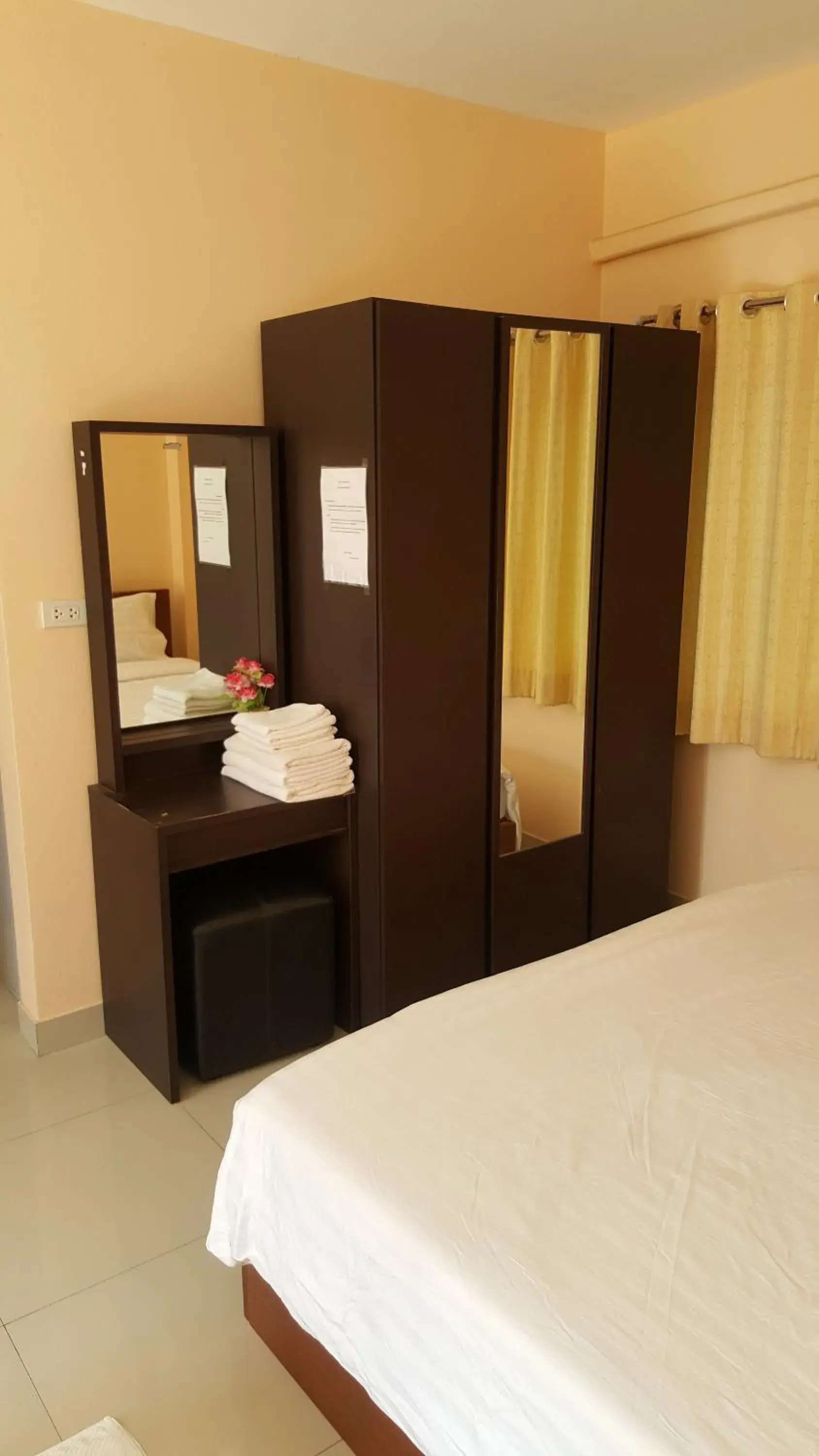 Bedroom, Bed in Jirasin Hotel & Apartment Bedroom, Bed in Jirasin Hotel & Apartment