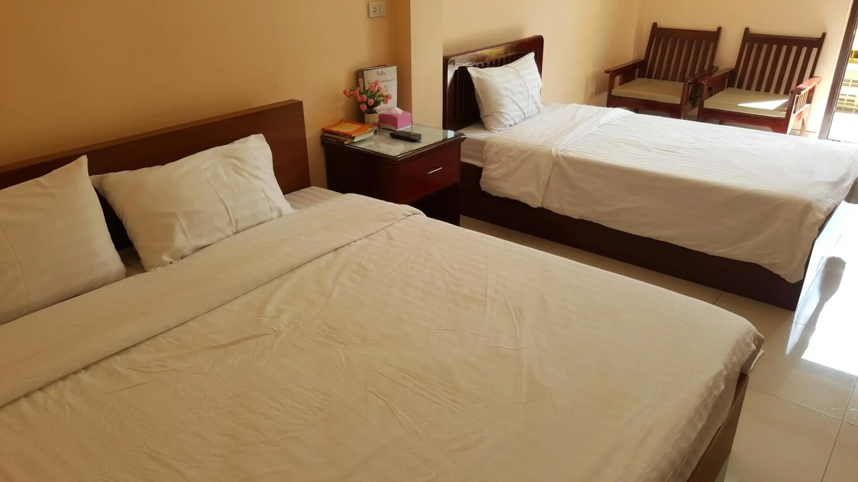 Bedroom, Bed in Jirasin Hotel & Apartment Bedroom, Bed in Jirasin Hotel & Apartment