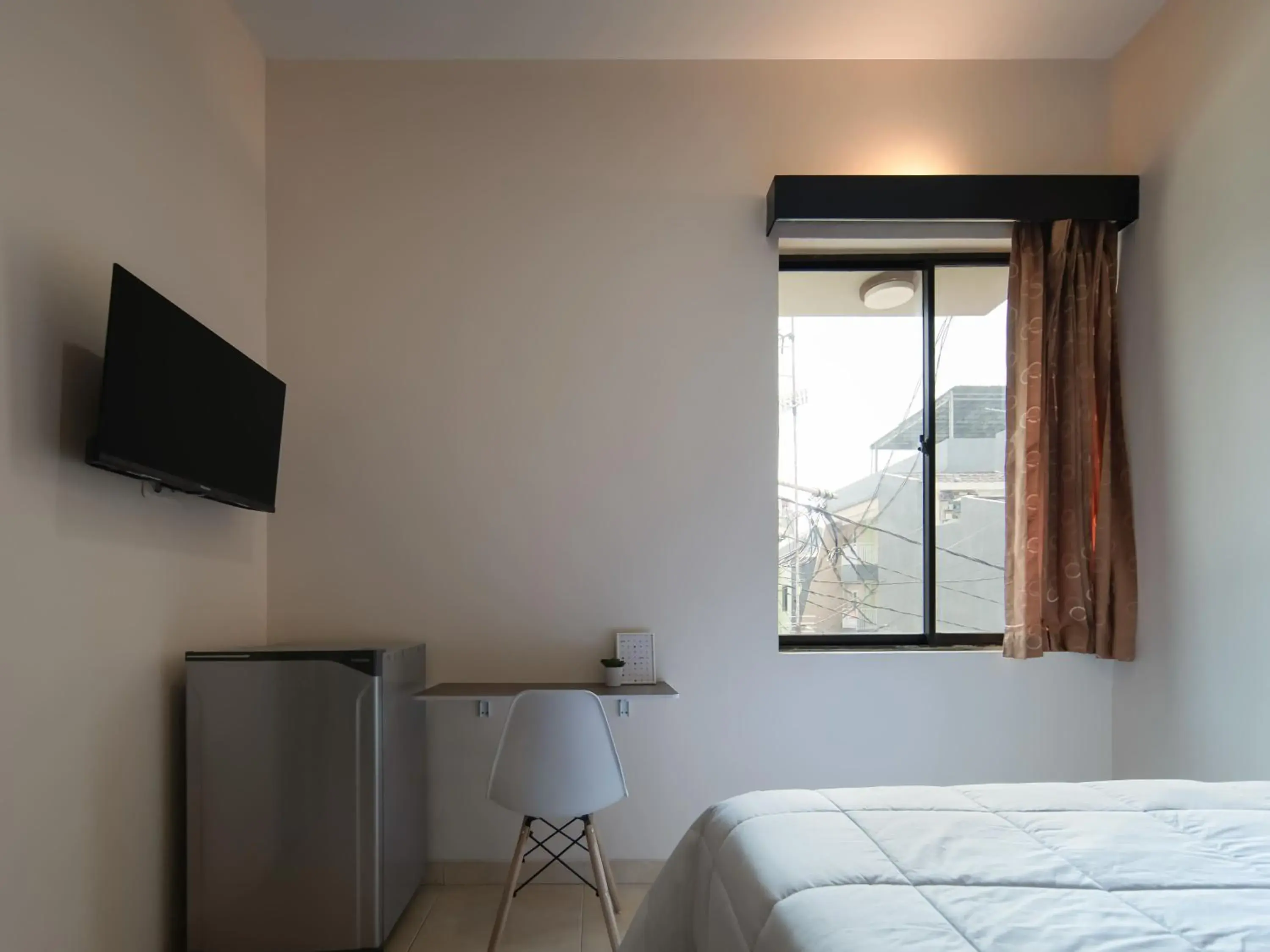 Bedroom, TV/Entertainment Center in Cove Oekude Residence Bedroom, TV/Entertainment Center in Cove Oekude Residence