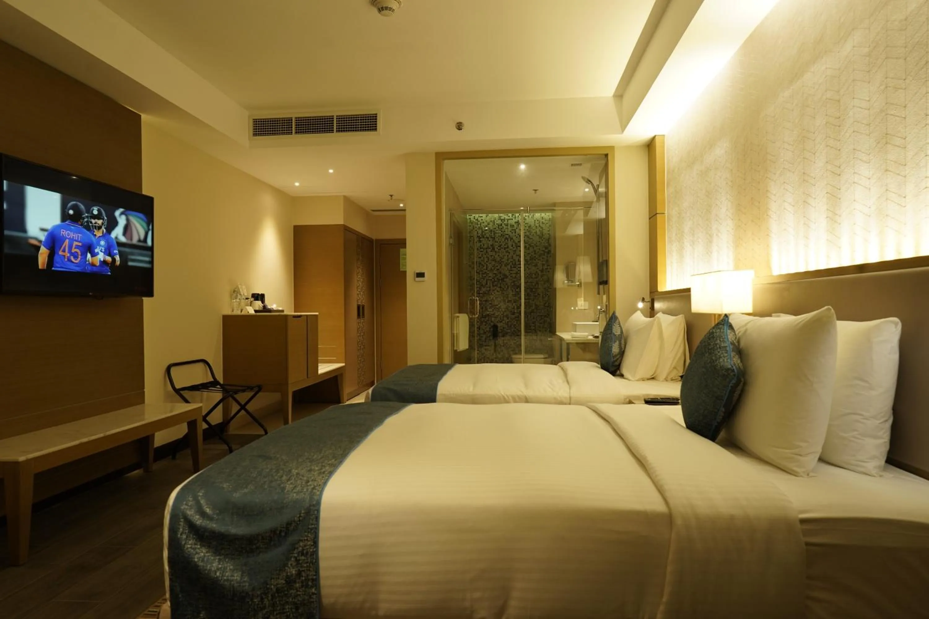 Bedroom, Bed in Gokulam Grand Trivandrum