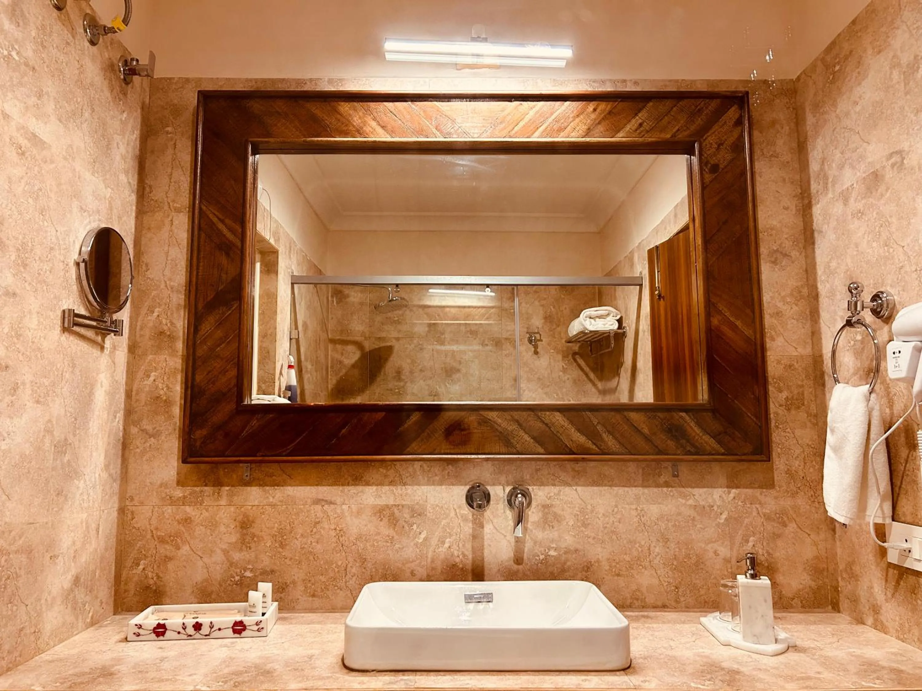 Shower in THE TRISHALA VILAS (A LUXURY BOUTIQUE HOTEL & SPA)