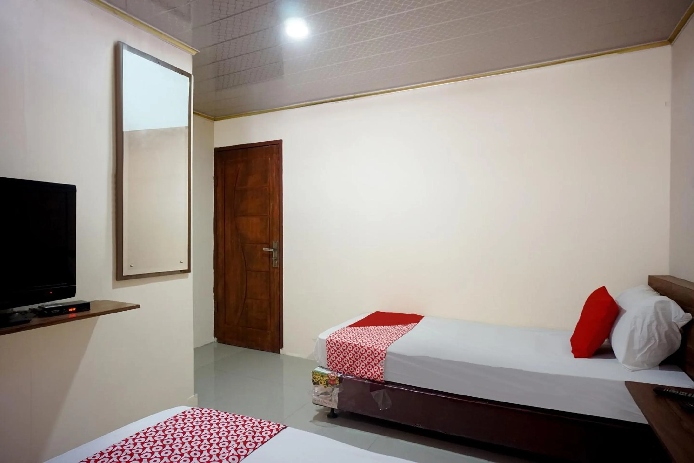 Bedroom in OYO 93066 D'niel Homestay Syariah