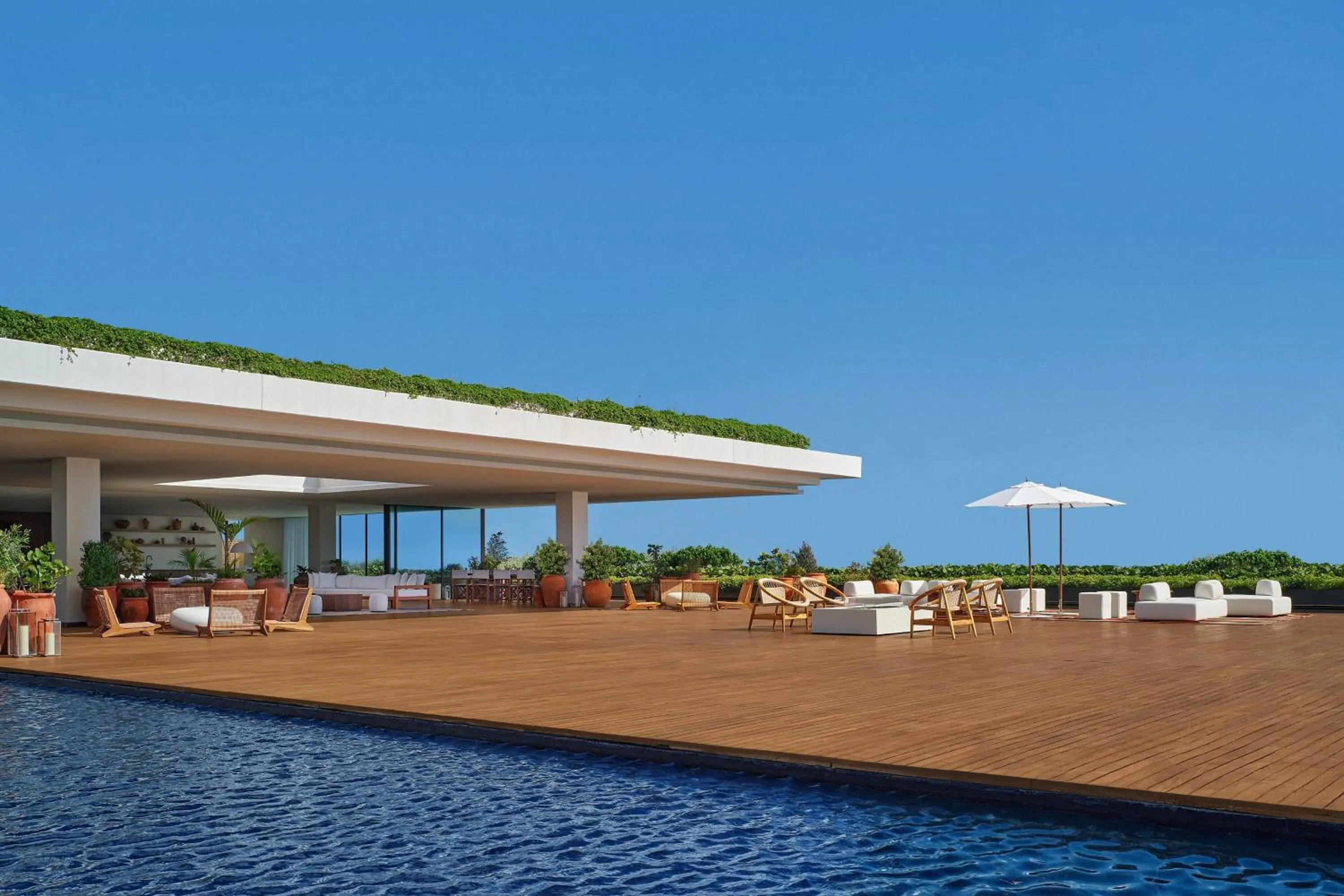 Lounge or bar in The Riviera Maya EDITION at Kanai