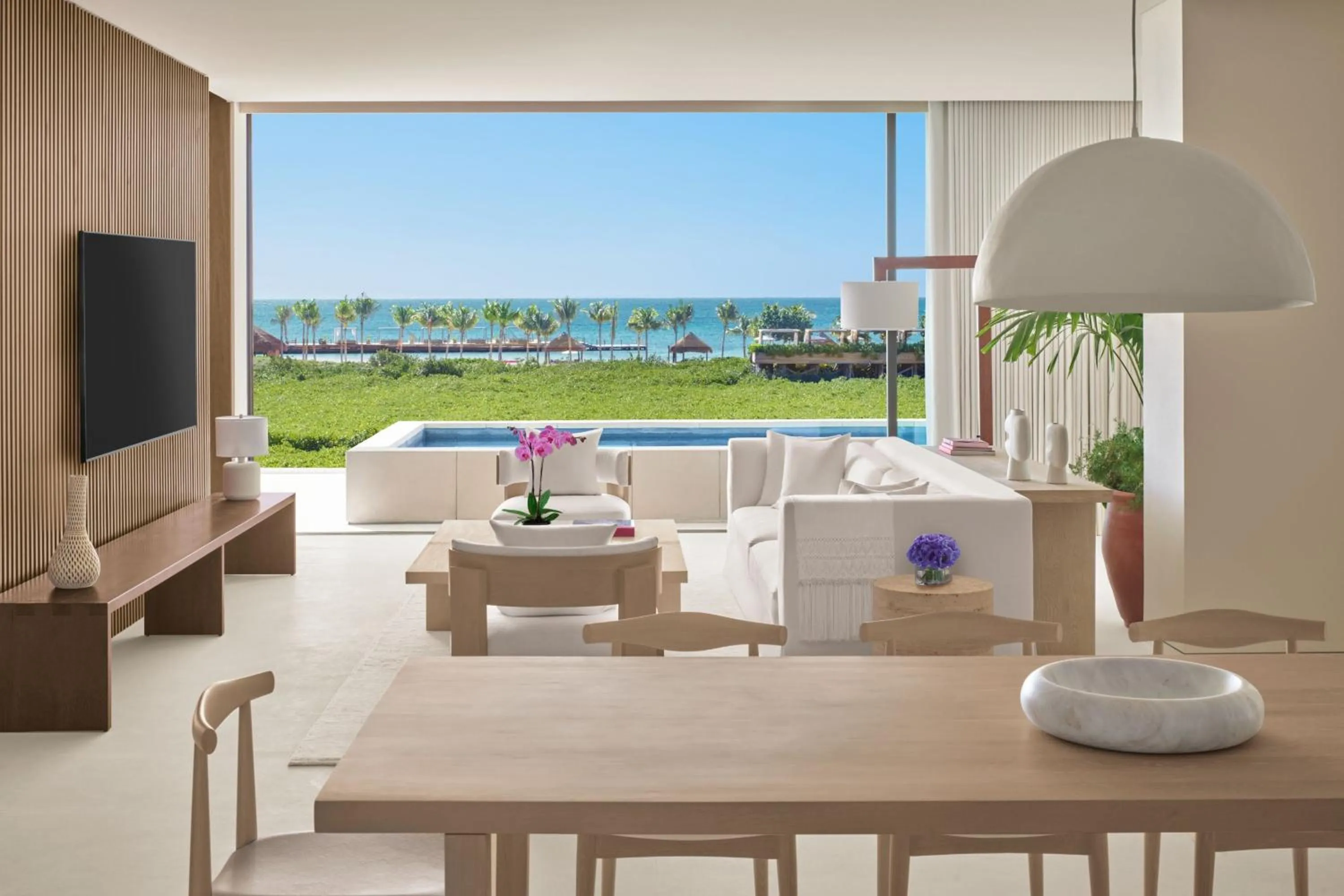 Living room in The Riviera Maya EDITION at Kanai