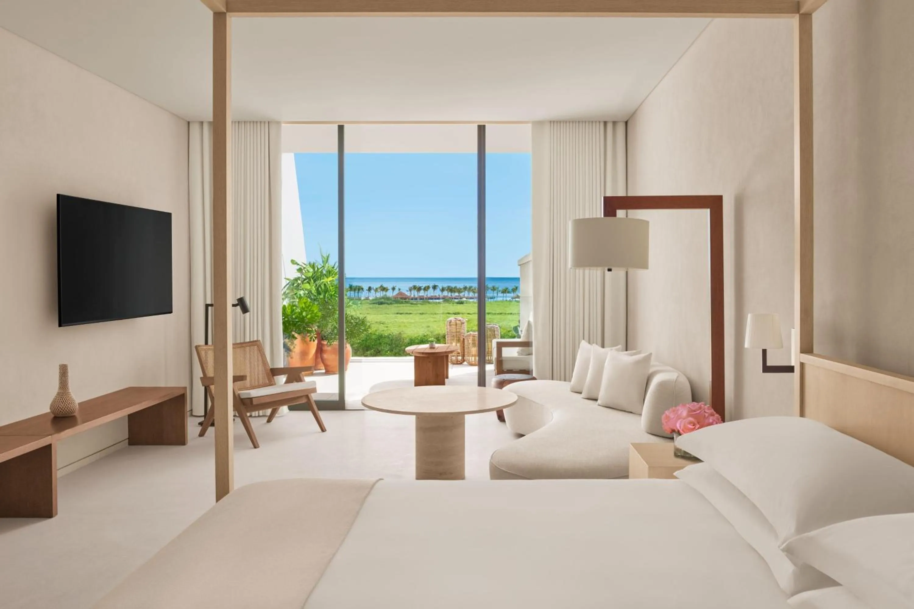 Living room, Bed in The Riviera Maya EDITION at Kanai