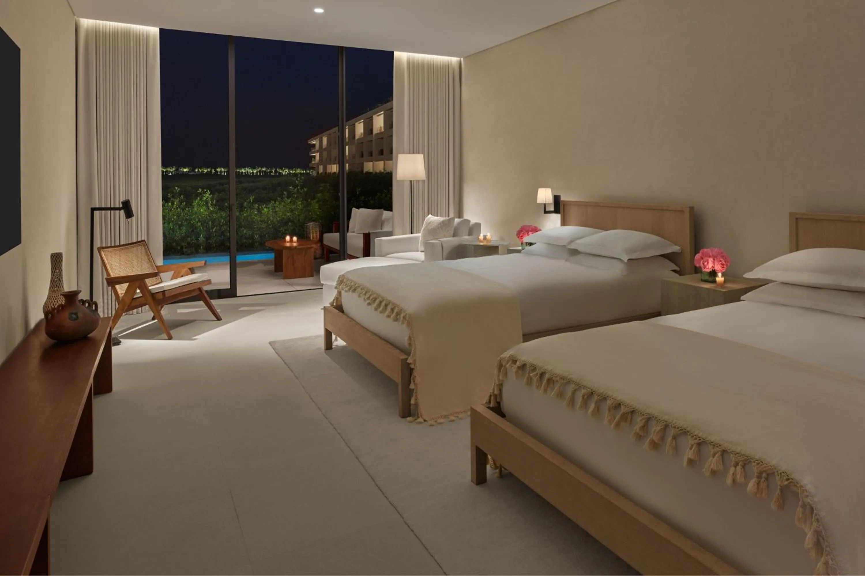 Photo of the whole room, Bed in The Riviera Maya EDITION at Kanai