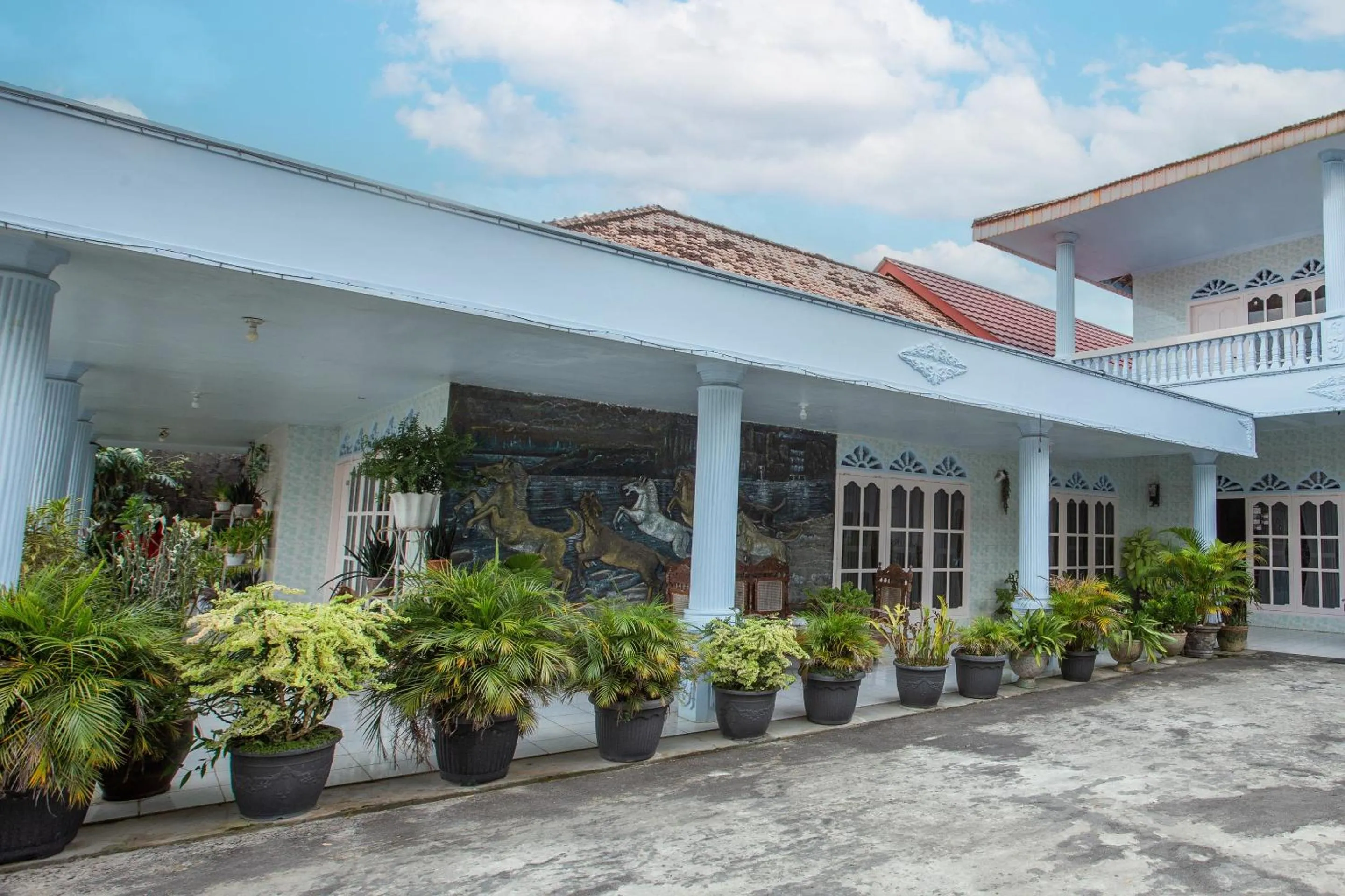 Facade/entrance in OYO Life 92803 Penginapan Purnama