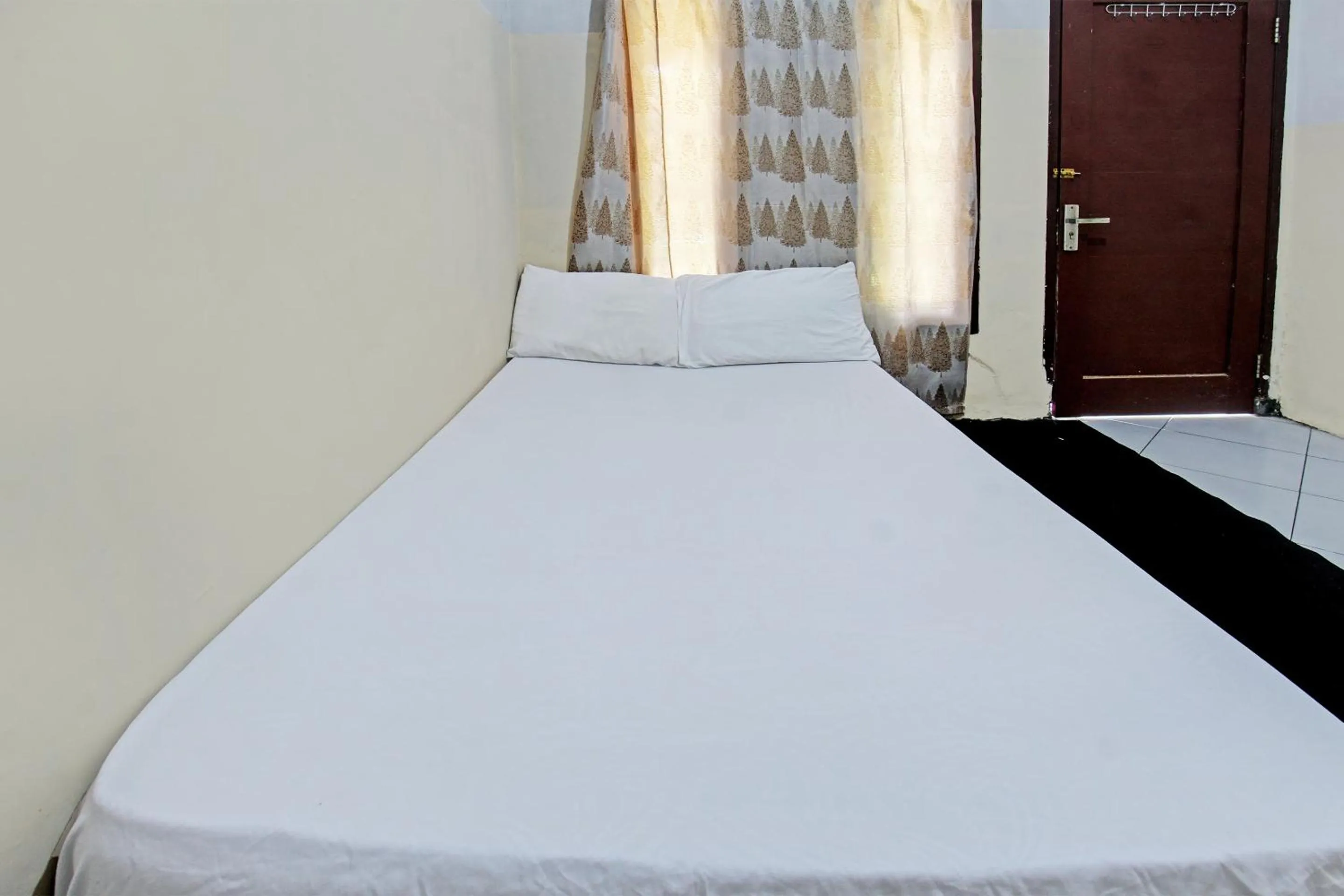 Bedroom in OYO Life 92853 Kost 999