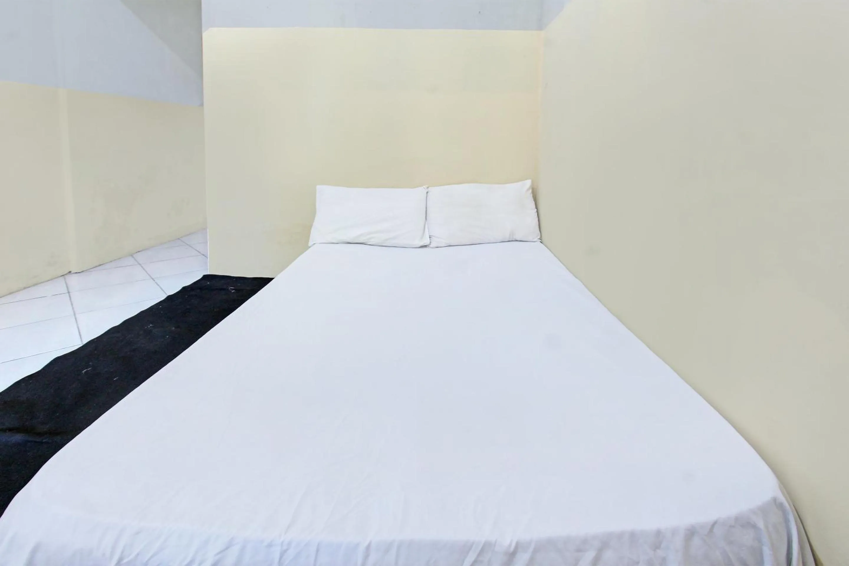 Bedroom in OYO Life 92853 Kost 999