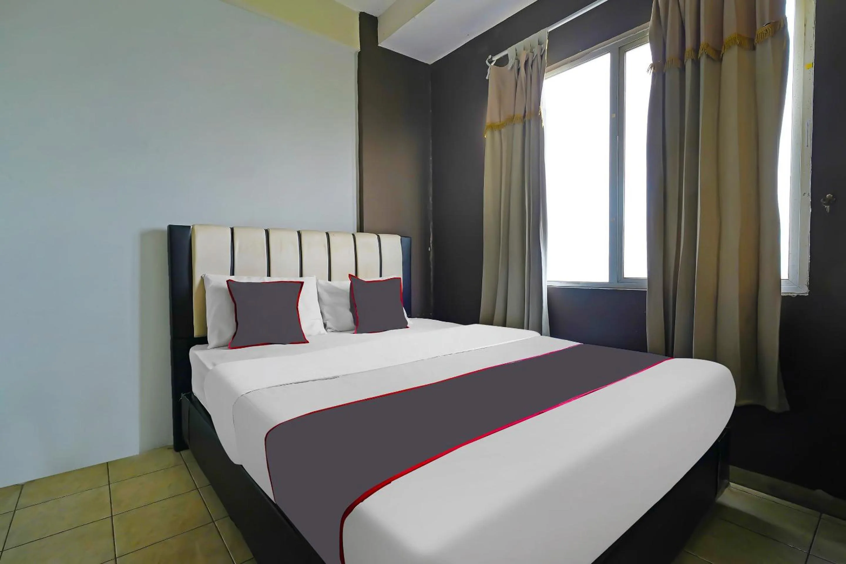 Bedroom in OYO Life 92774 The Edge Apartment By My Home