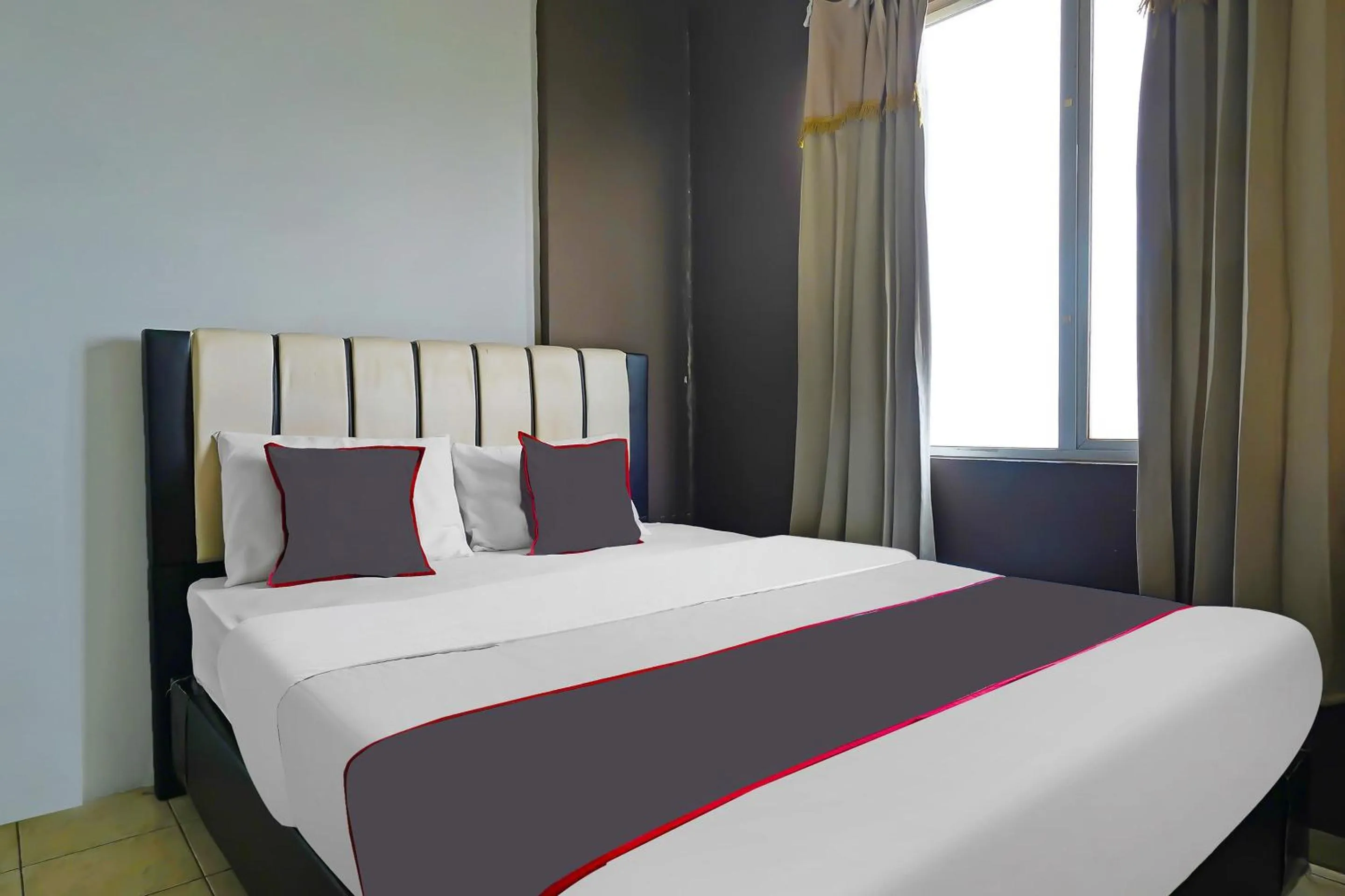 Bedroom in OYO Life 92774 The Edge Apartment By My Home