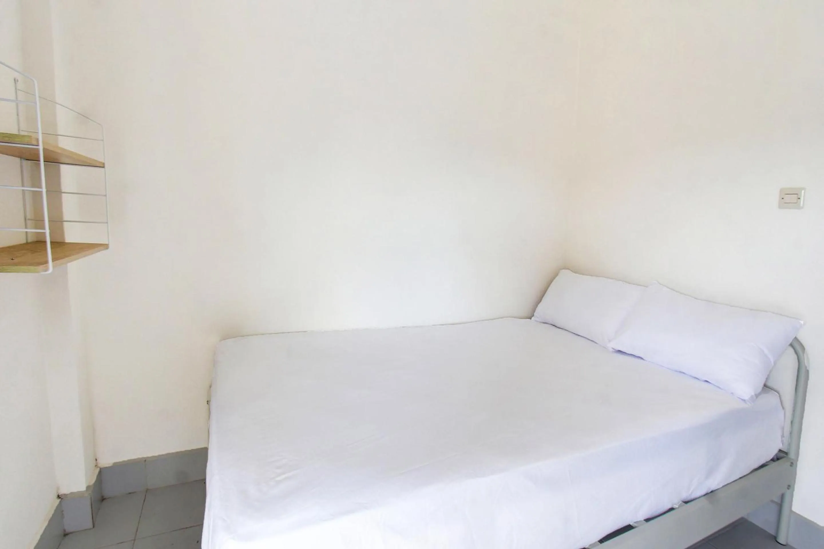 Bedroom in OYO Life 92769 Janigo Kos