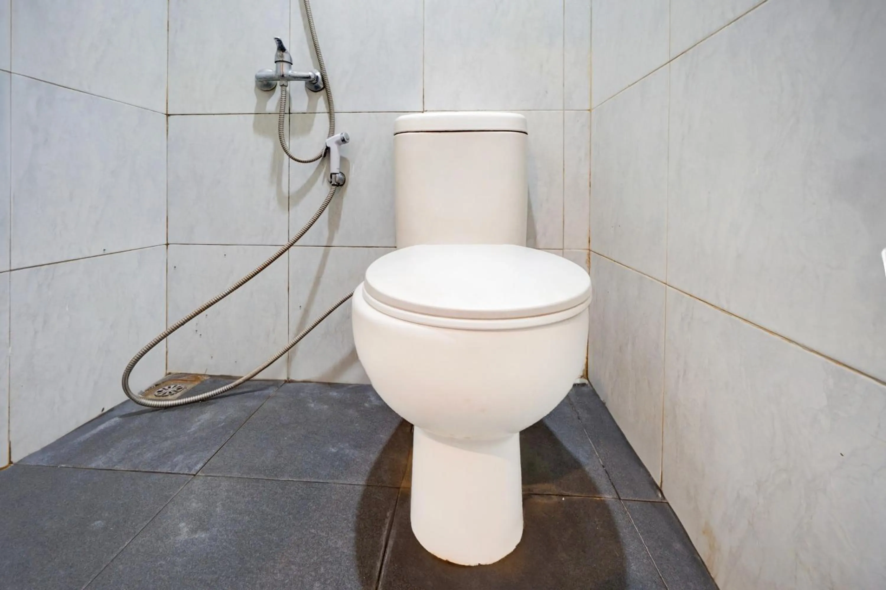 Bathroom in SPOT ON 93014 Griya Nautika Sukodono