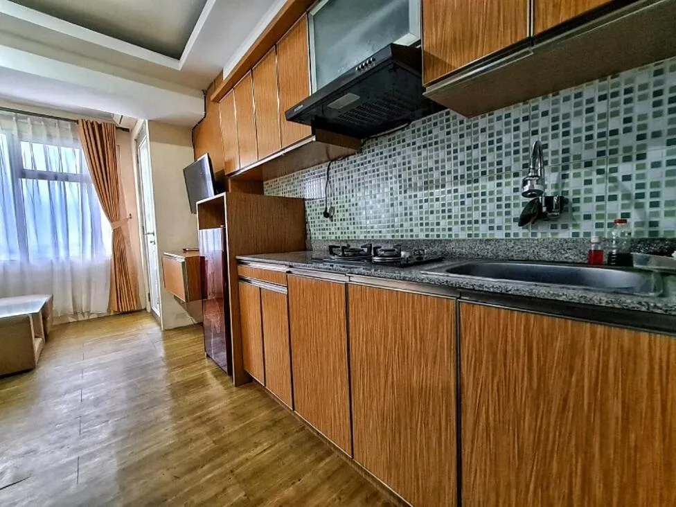 Bedroom in OYO Life 92649 Jarrdin Apartment By Glory