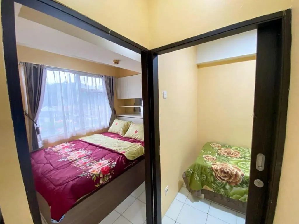 Bedroom, Bed in OYO Life 92649 Jarrdin Apartment By Glory