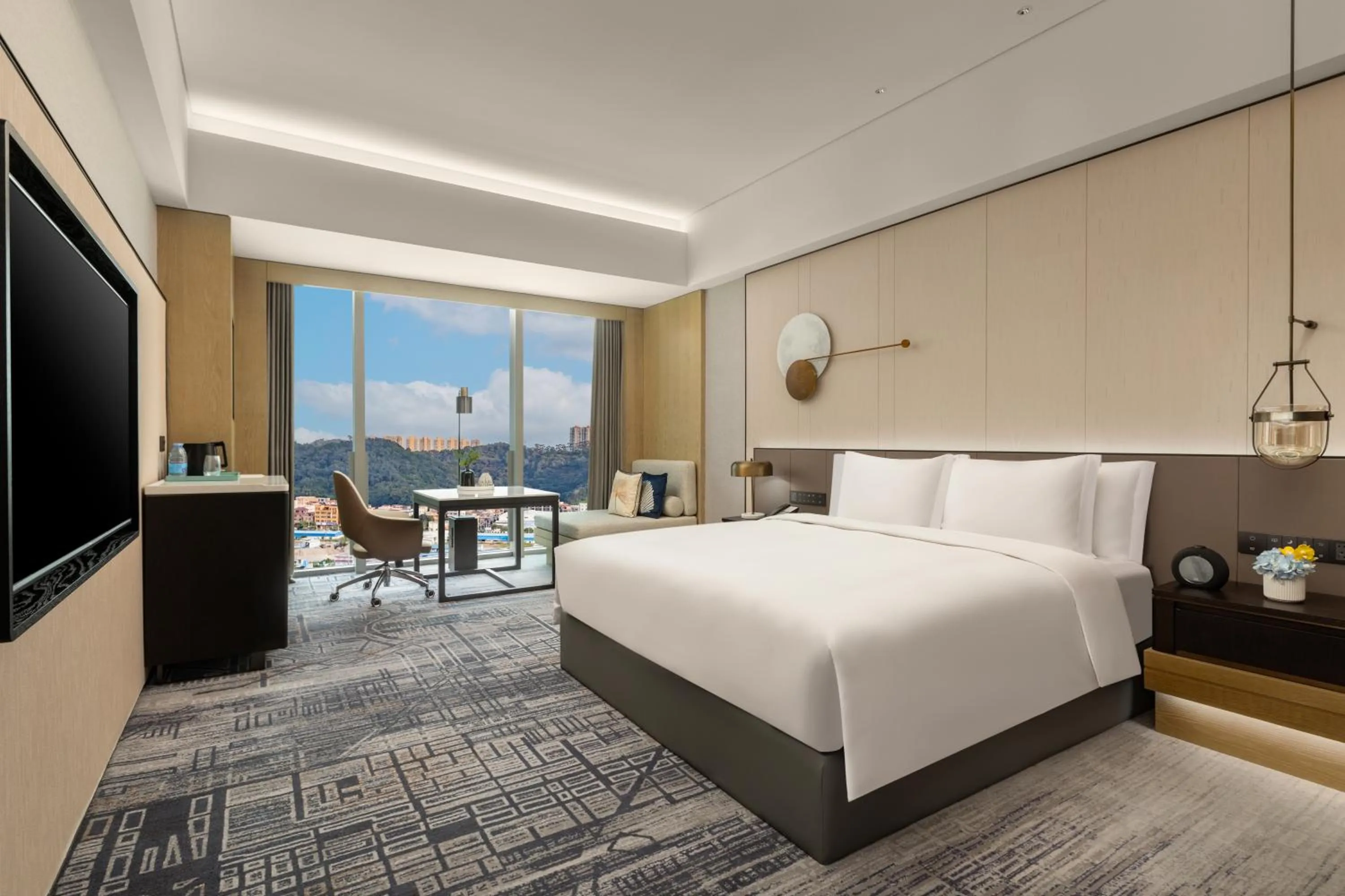 Photo of the whole room, Bed in Crowne Plaza Jiangmen Binjiang by IHG