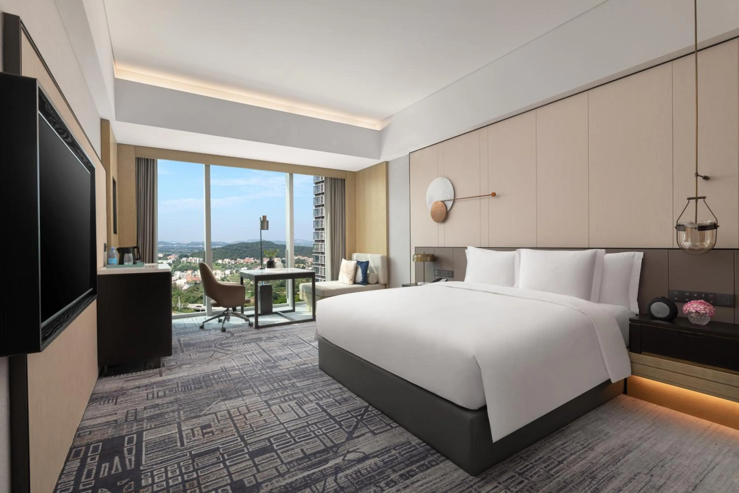 Photo of the whole room, Bed in Crowne Plaza Jiangmen Binjiang by IHG