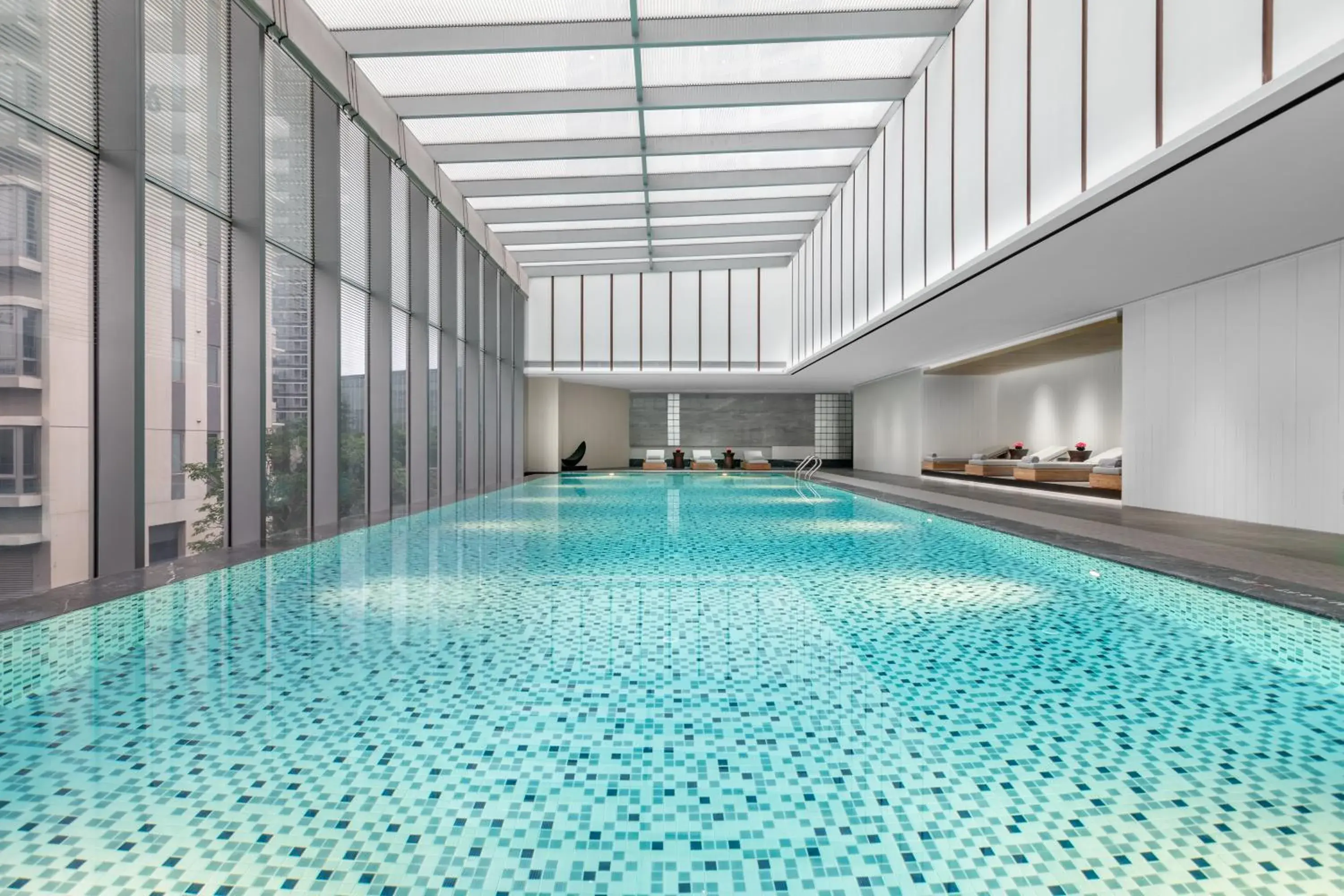Swimming pool in Crowne Plaza Jiangmen Binjiang by IHG Swimming pool in Crowne Plaza Jiangmen Binjiang by IHG
