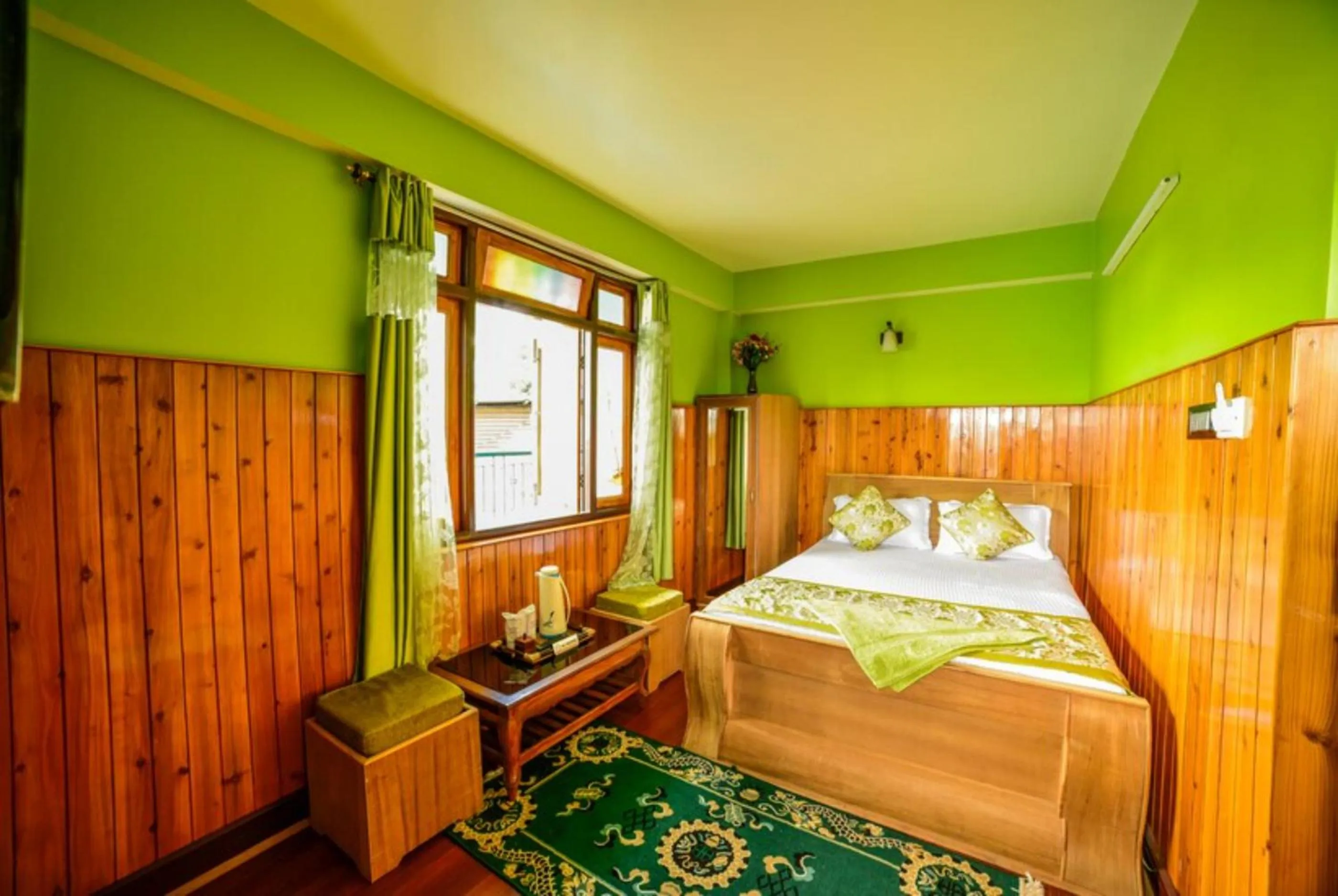Bed in GRG Tharbaling Homestay Darjeeling