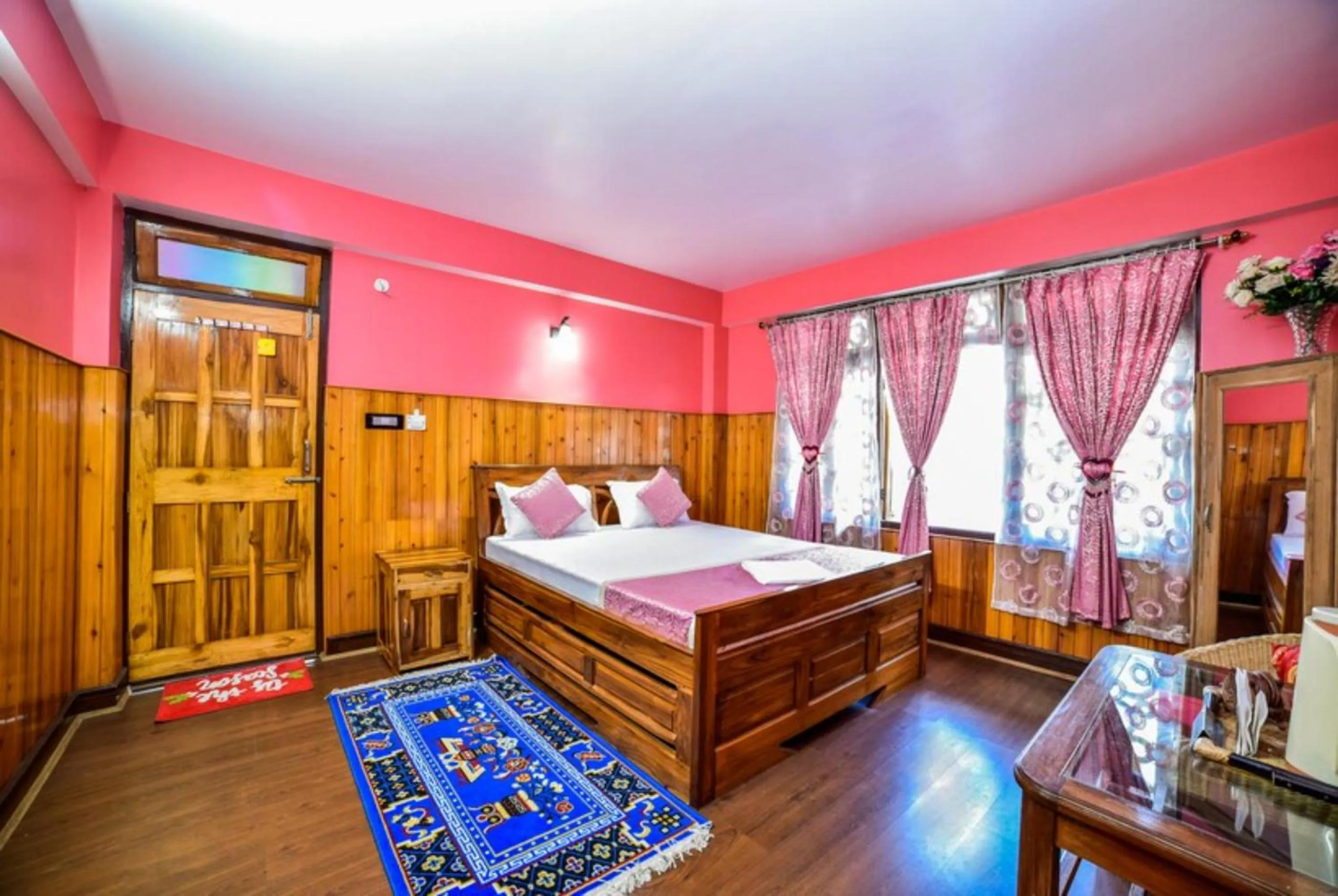Bed in GRG Tharbaling Homestay Darjeeling