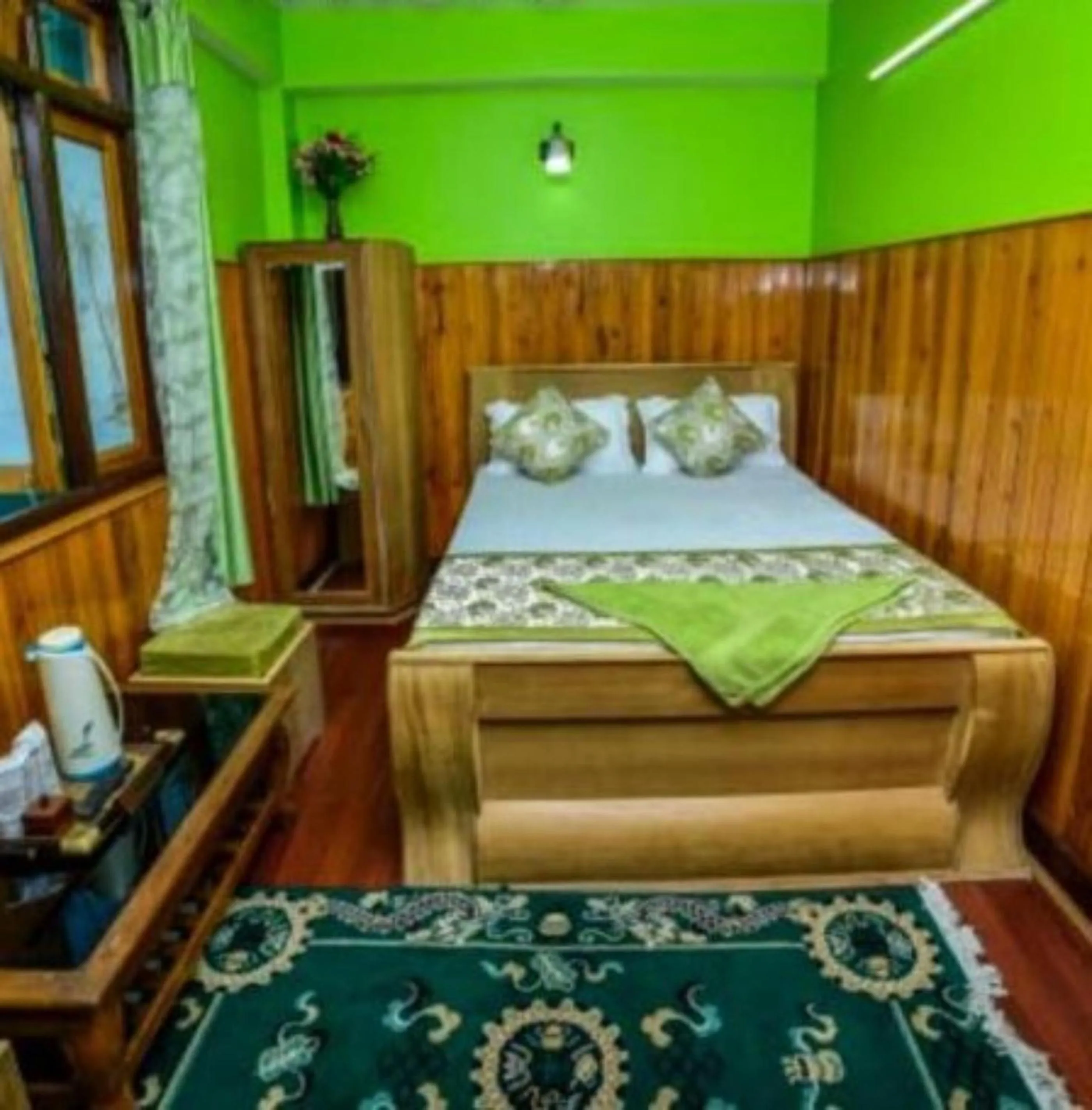 Bed in GRG Tharbaling Homestay Darjeeling