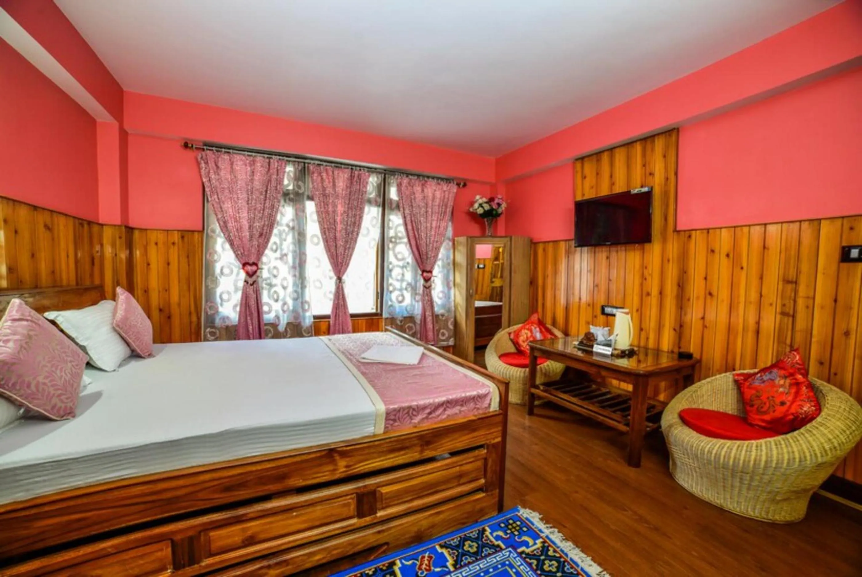 Bed in GRG Tharbaling Homestay Darjeeling
