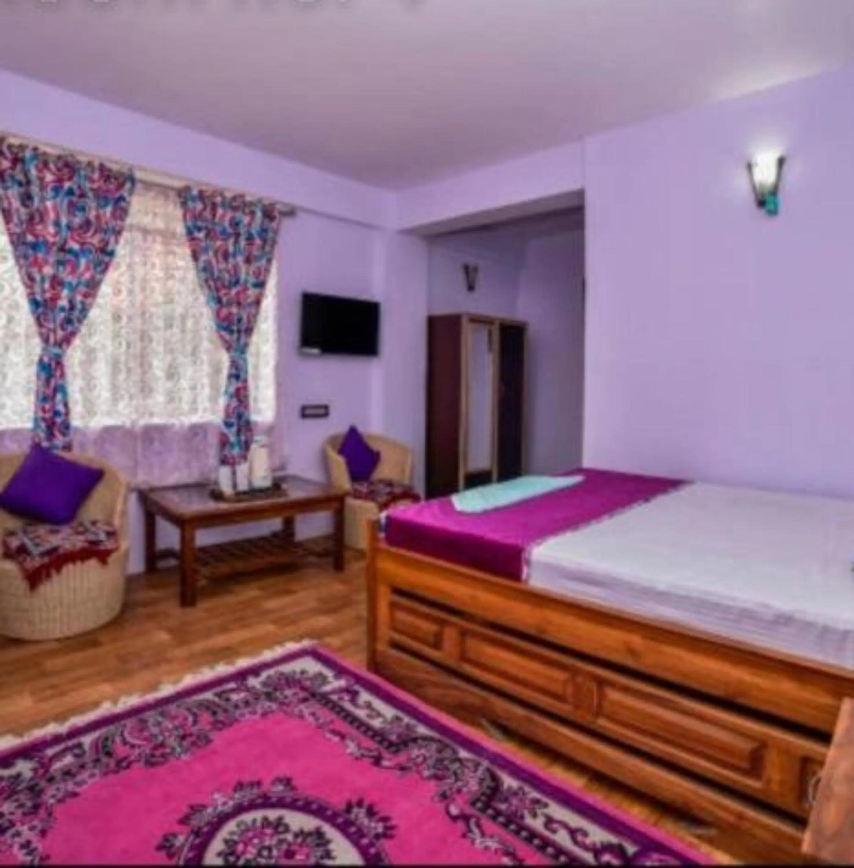 Bed in GRG Tharbaling Homestay Darjeeling