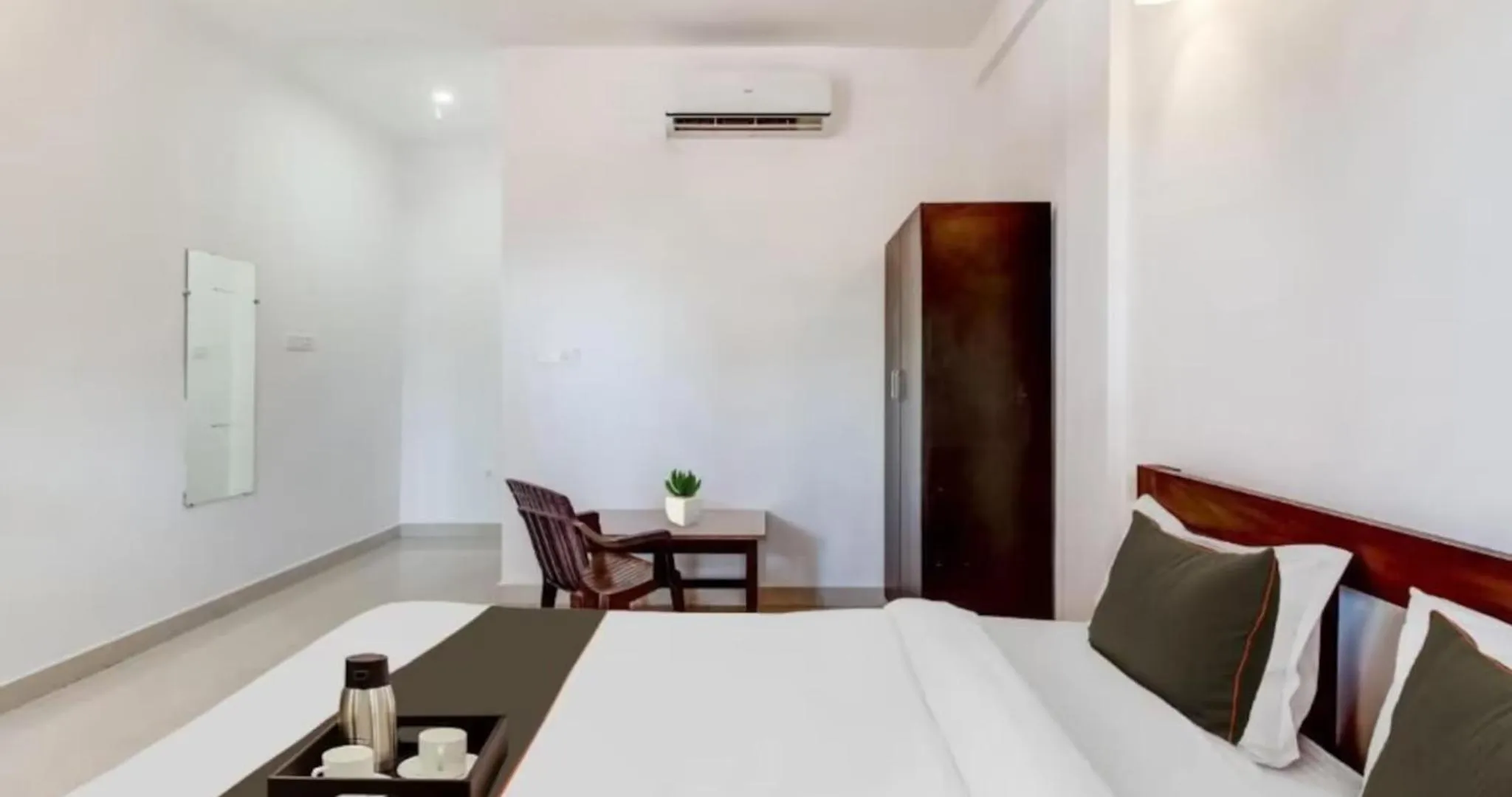 Photo of the whole room, Bed in Aqua Wave by YogiTree Hotels