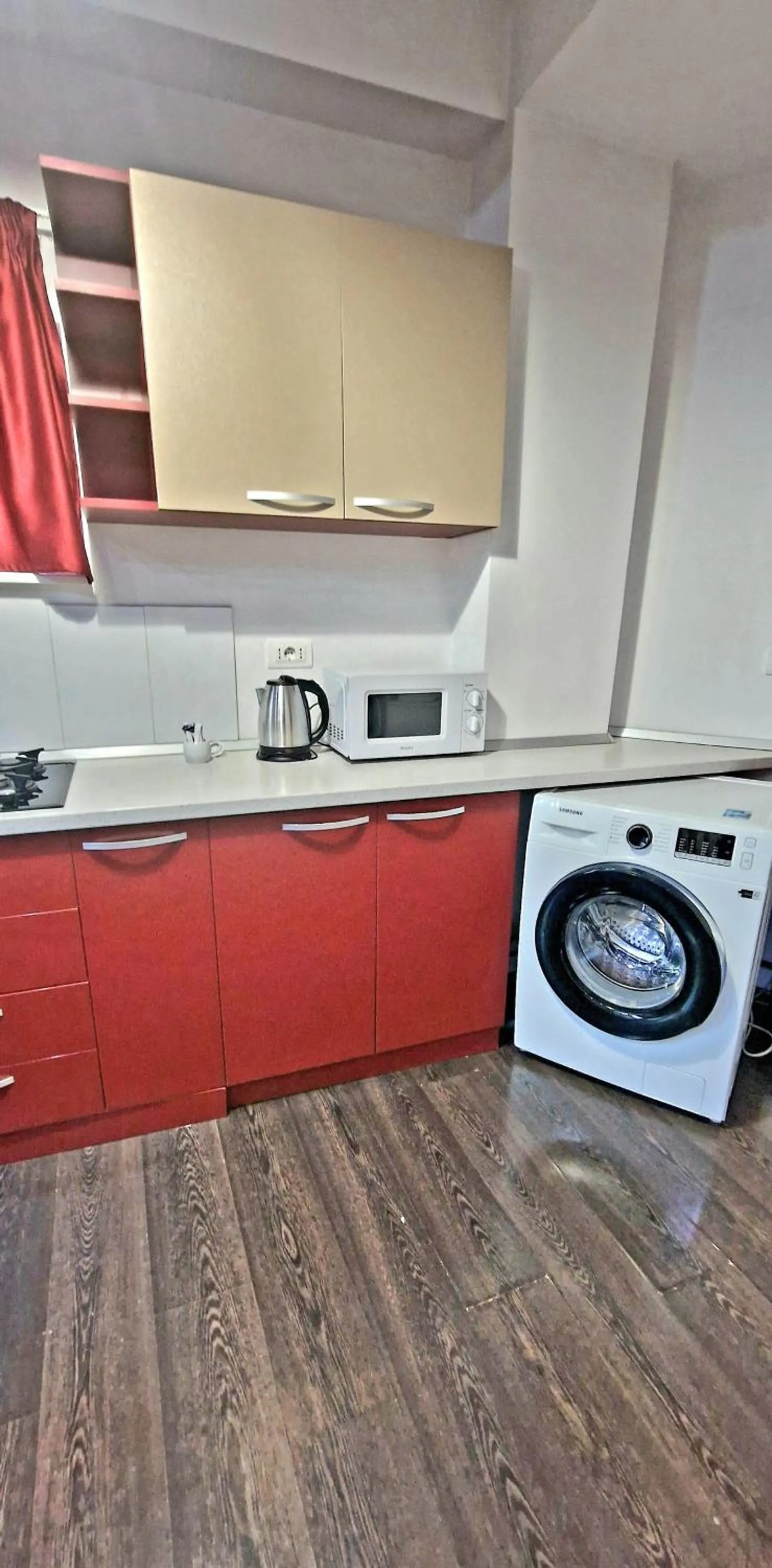 washing machine in Hotel Jolie Apartments