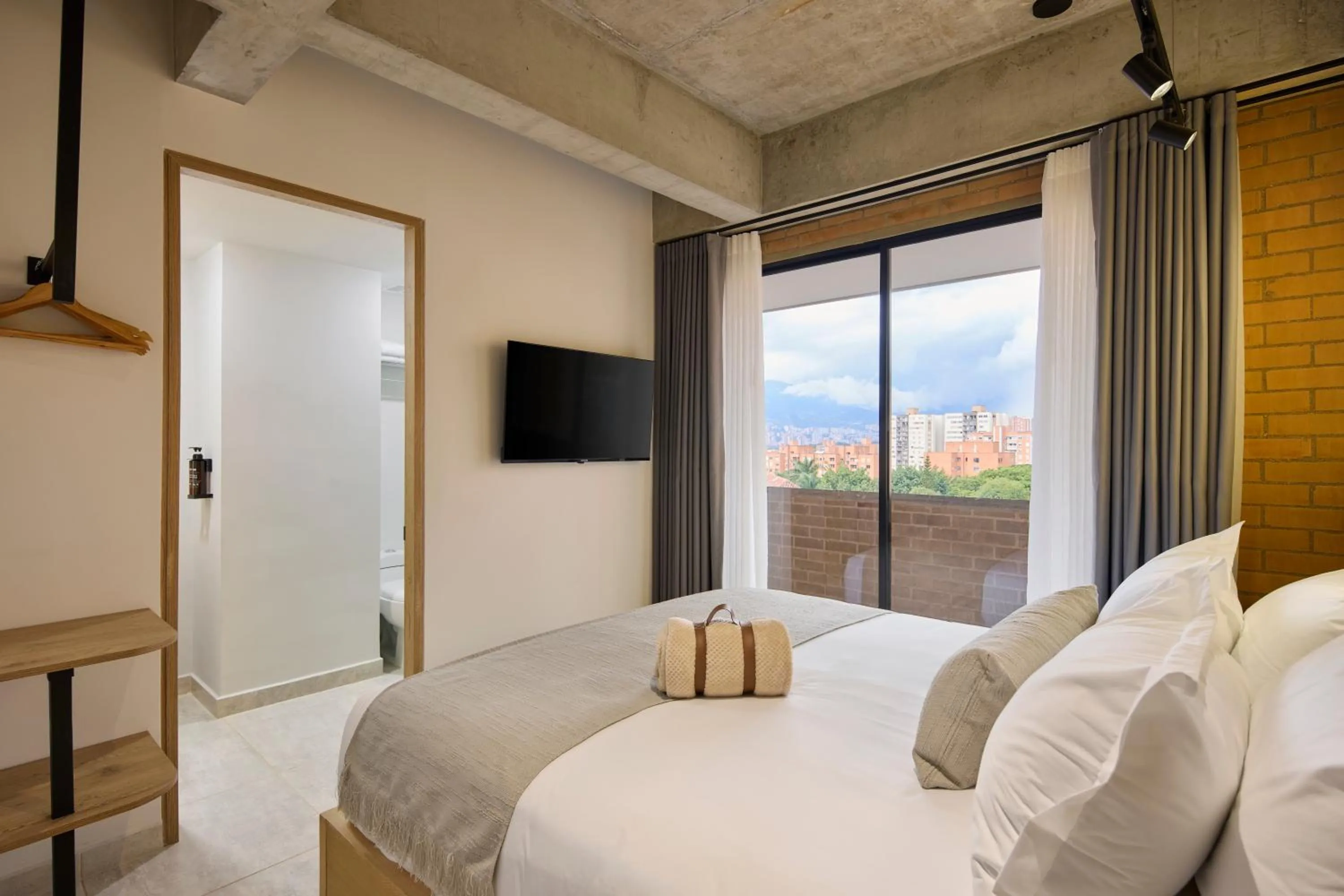 Bedroom in 30 Living Suites