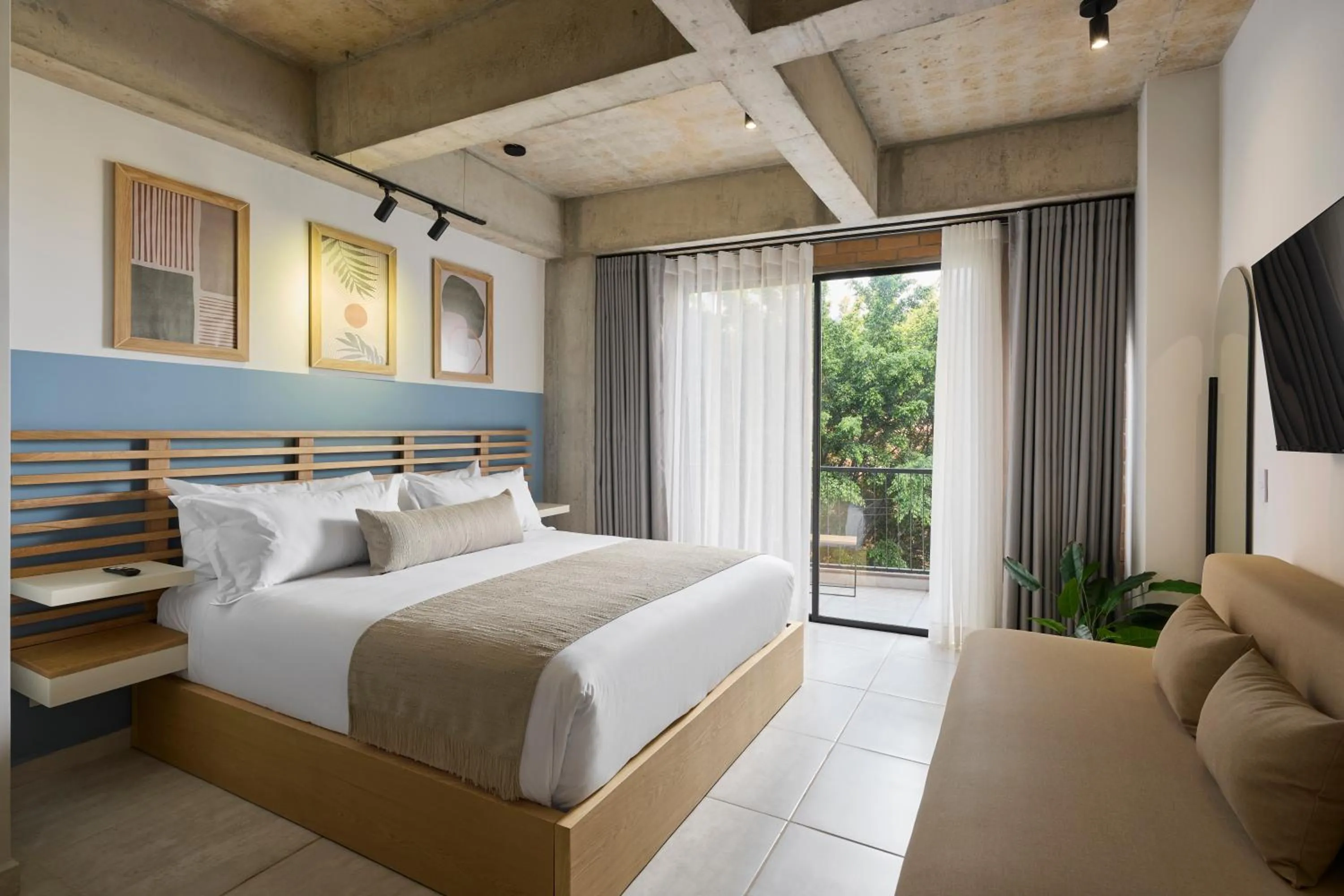 Bedroom in 30 Living Suites