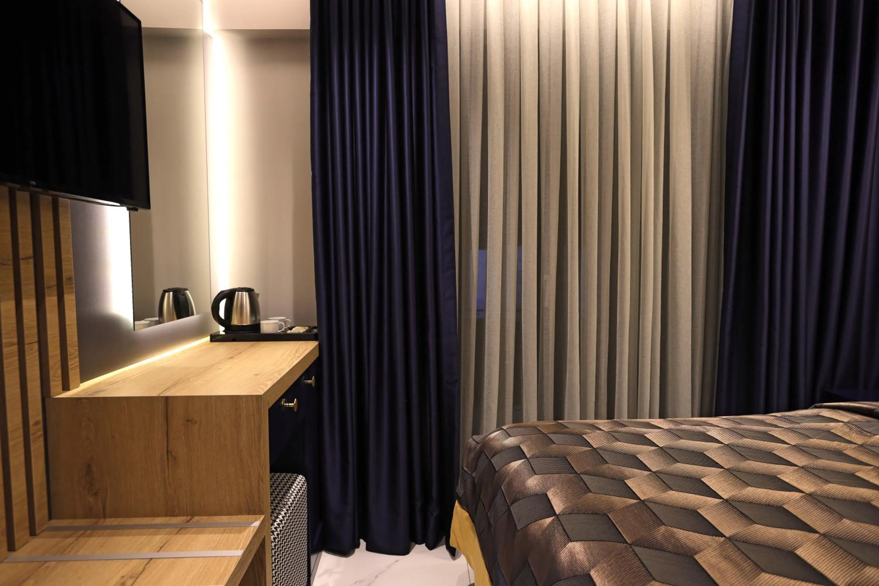Bed in AMASRA DADAYLI HOTEL