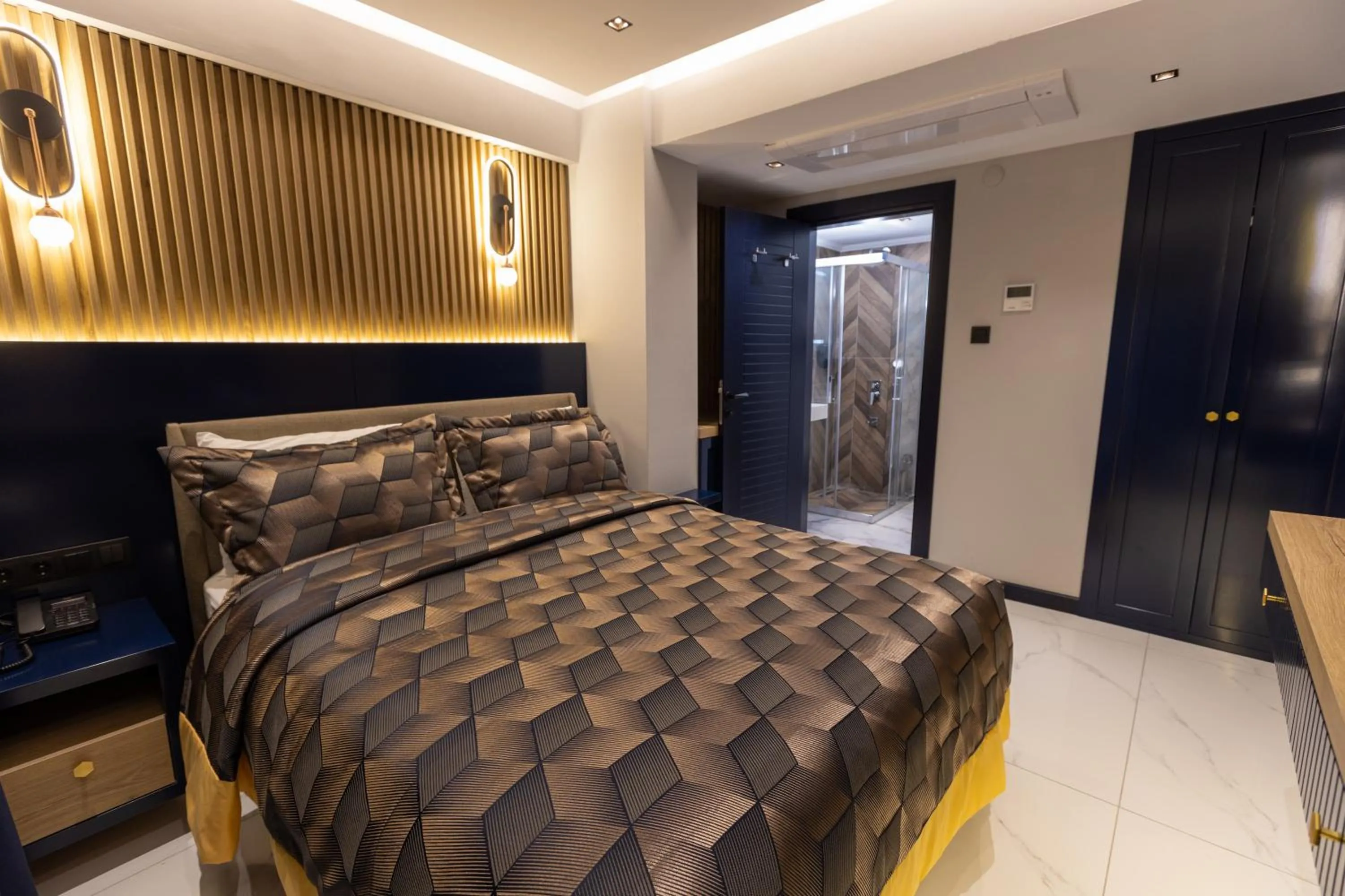 Bed in AMASRA DADAYLI HOTEL