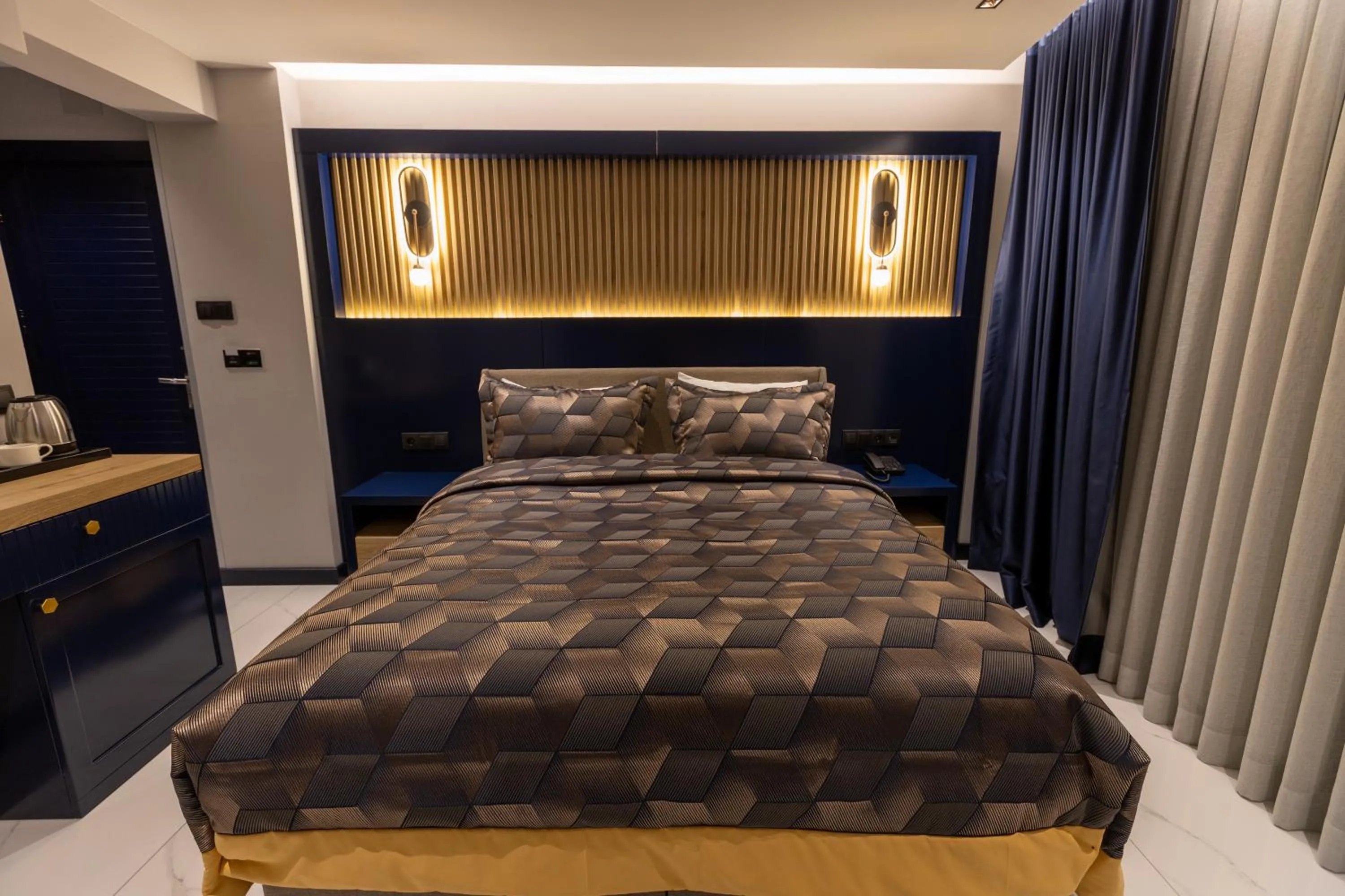 Bed in AMASRA DADAYLI HOTEL